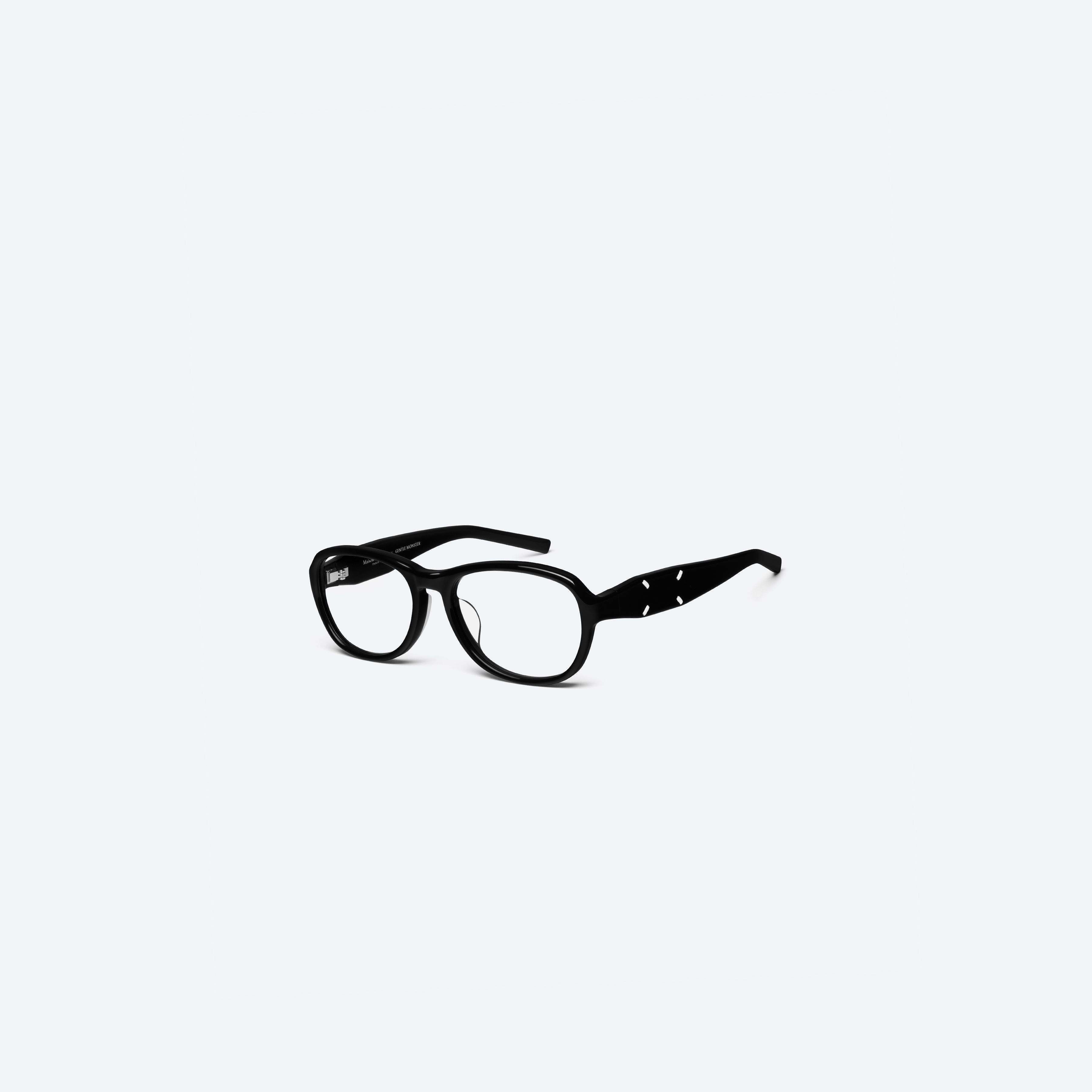 45-degree view of Gentle Monster Maison Margiela - MM303 01 Black Acetate framed Aviator glasses.