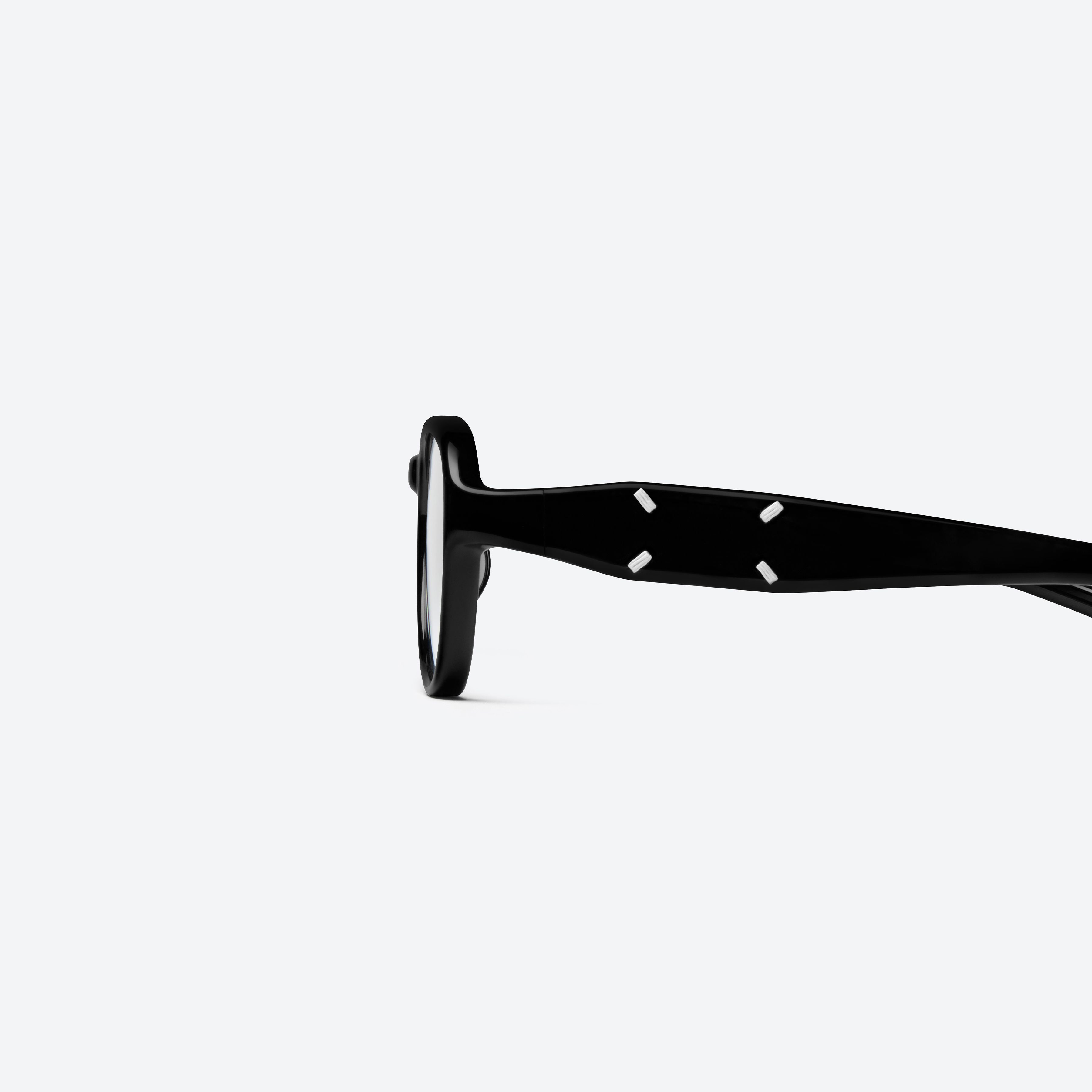 A detailed left view of Gentle Monster Maison Margiela - MM303 01 Black Acetate framed Aviator glasses.