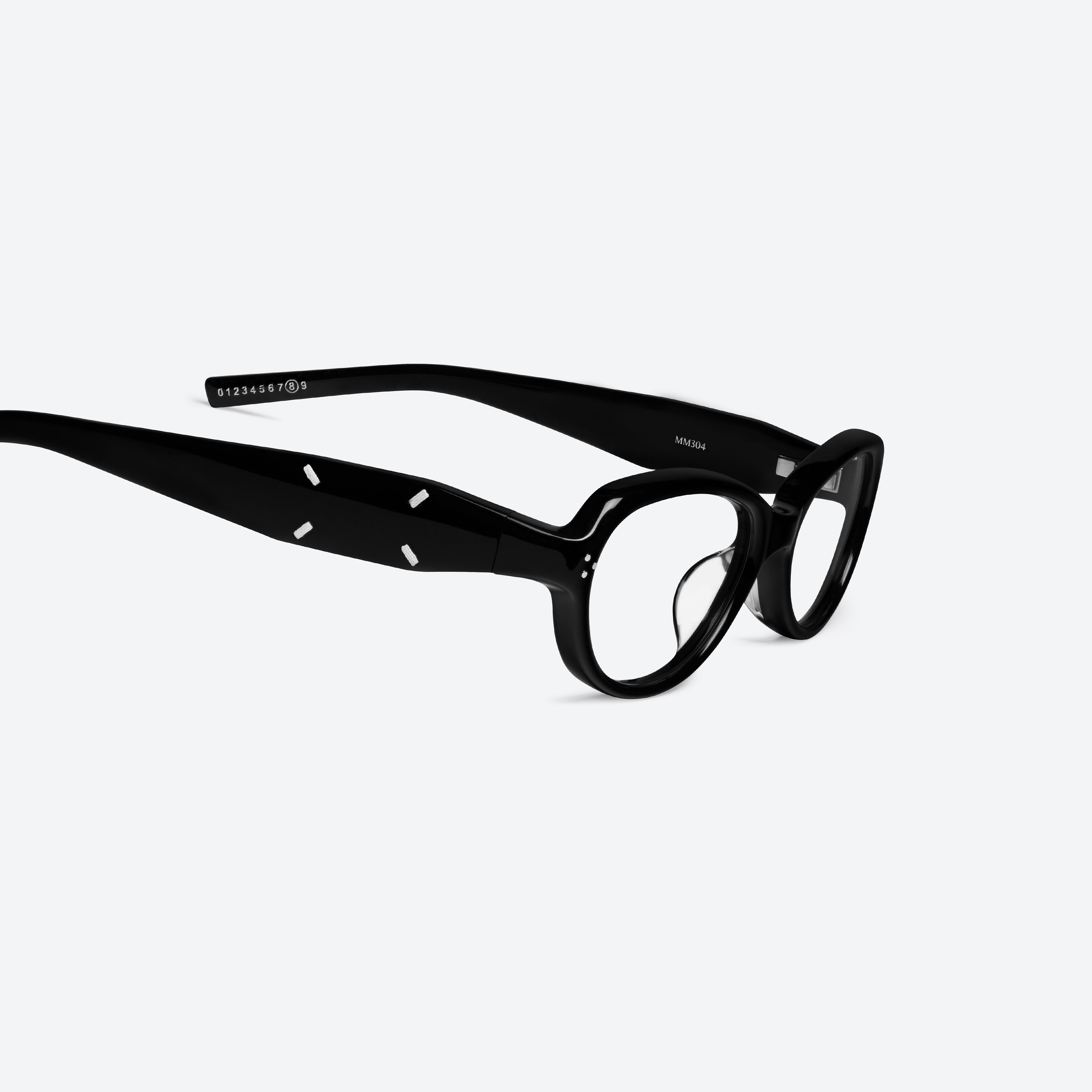 45-degree detailed view of Gentle Monster Maison Margiela - MM304 01 Black Acetate framed Aviator glasses.