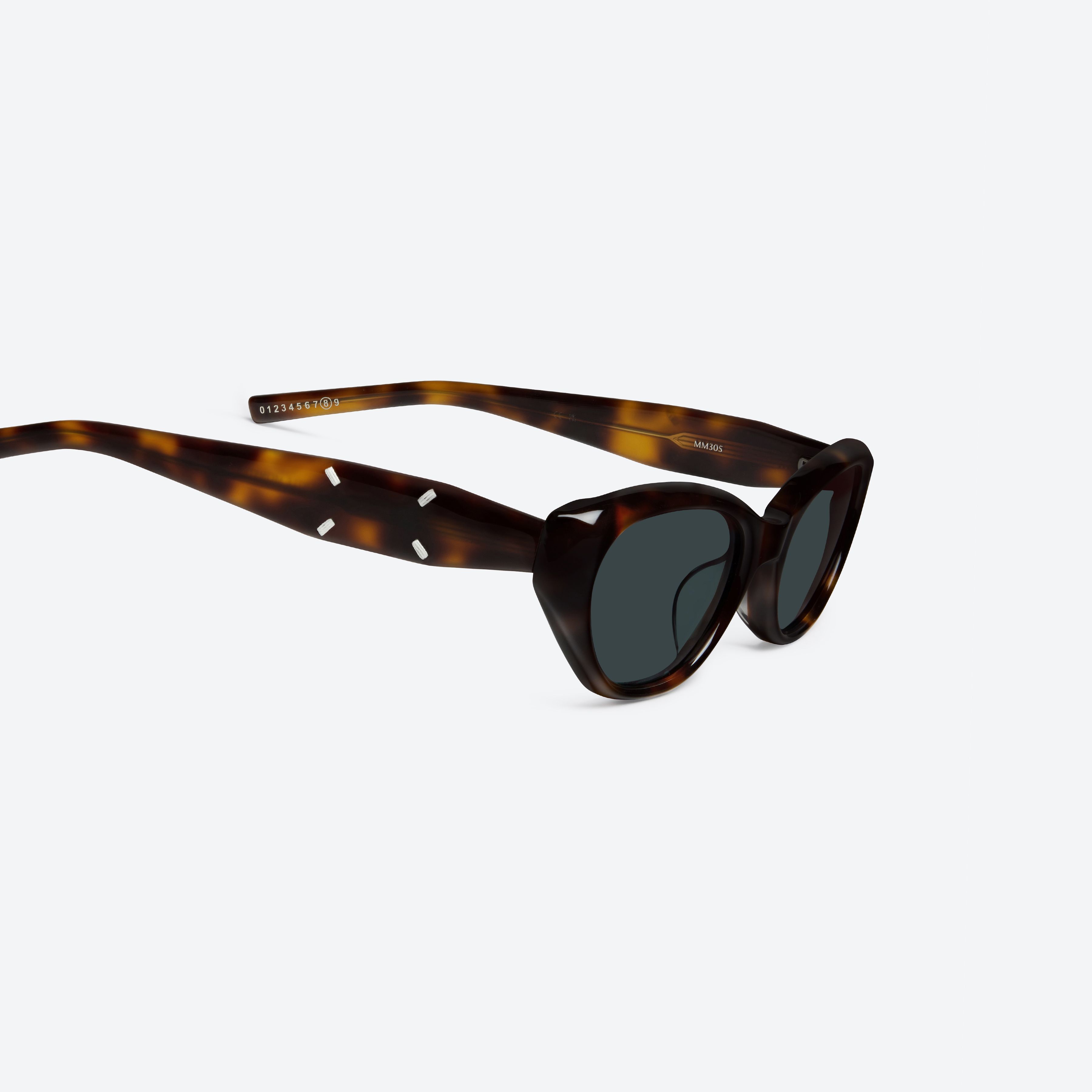 45-degree detailed view of Gentle Monster Maison Margiela - MM305 L2 Tortoise Acetate framed Cat-eye sunglasses.
