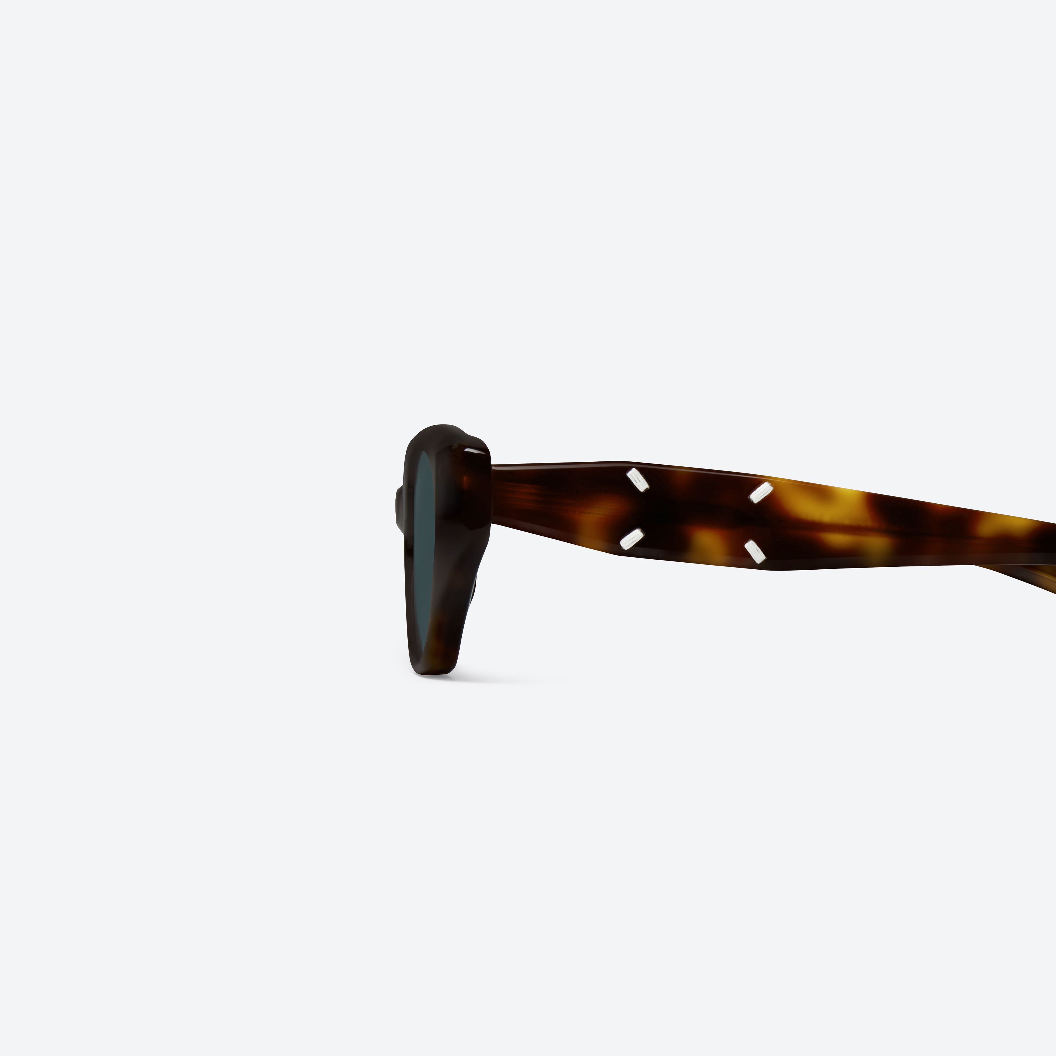 A detailed left view of Gentle Monster Maison Margiela - MM305 L2 Tortoise Acetate framed Cat-eye sunglasses.