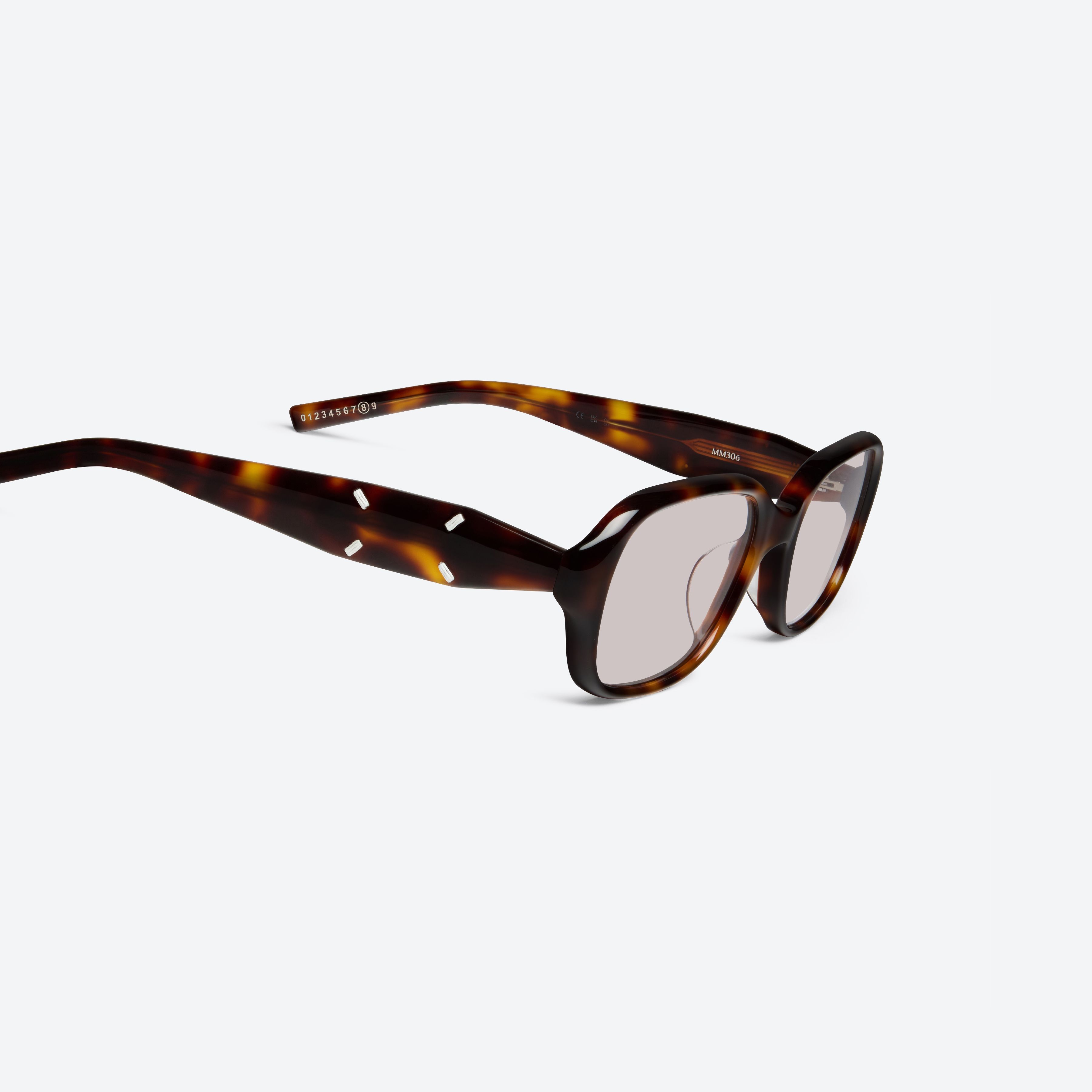 45-degree detailed view of Gentle Monster Maison Margiela - MM306 L2 Tortoise Acetate framed Square sunglasses.