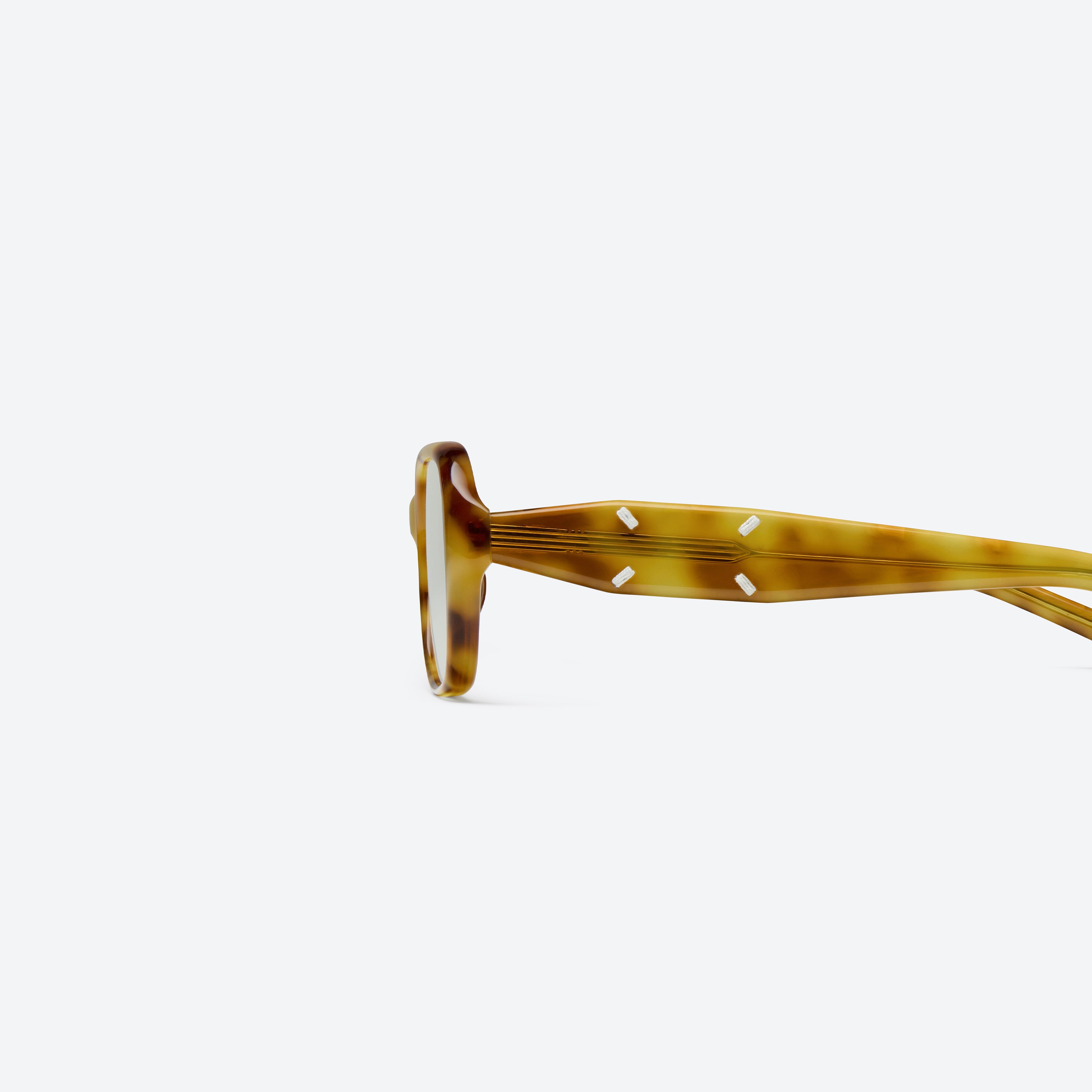 A detailed left view of Gentle Monster Maison Margiela - MM306 T12 Tortoise Acetate framed Square sunglasses.