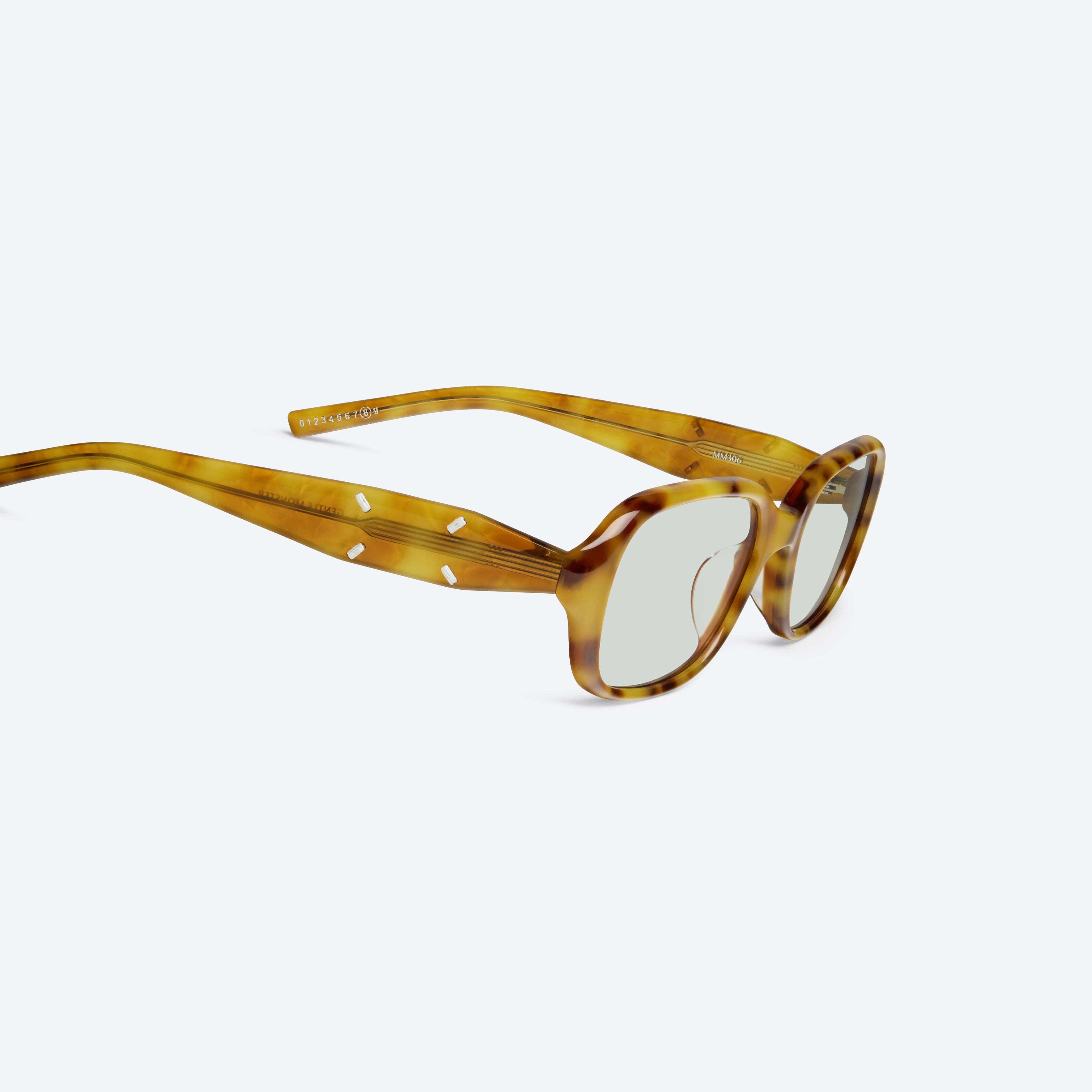45-degree detailed view of Gentle Monster Maison Margiela - MM306 T12 Tortoise Acetate framed Square sunglasses.