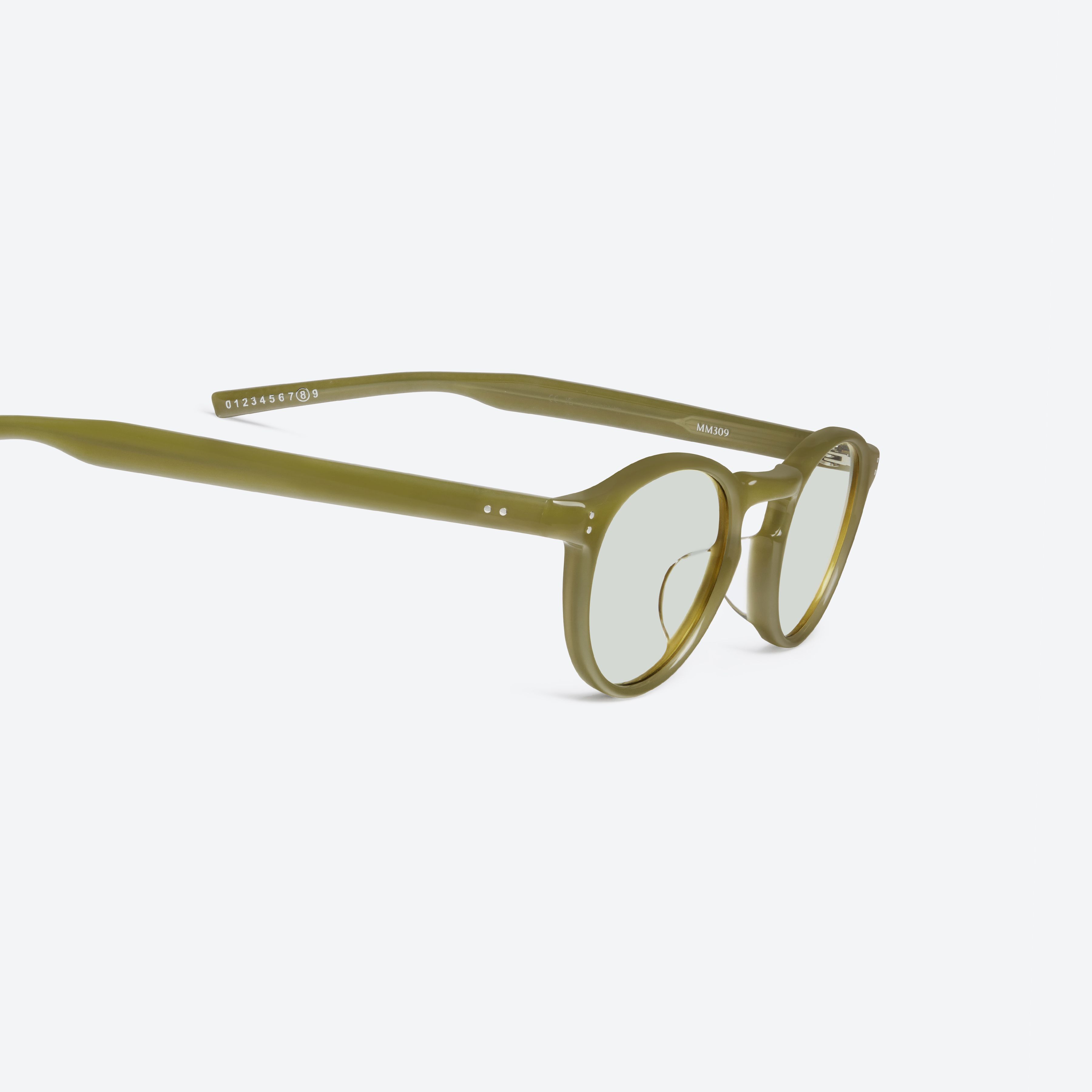 45-degree detailed view of Gentle Monster Maison Margiela - MM309 GRC7 Green Acetate framed Round sunglasses.