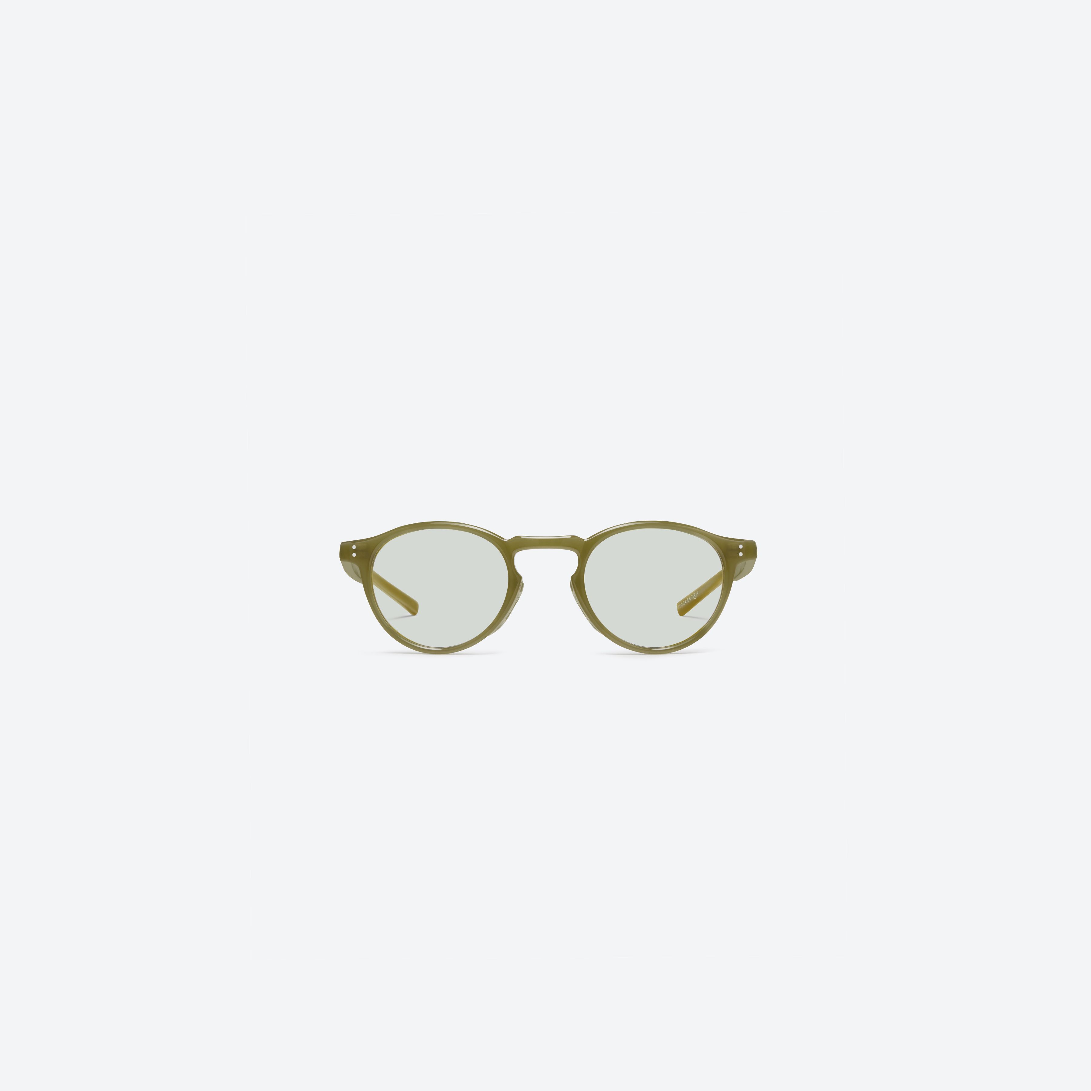 A front view of Gentle Monster Maison Margiela - MM309 GRC7 Green Acetate framed Round sunglasses.