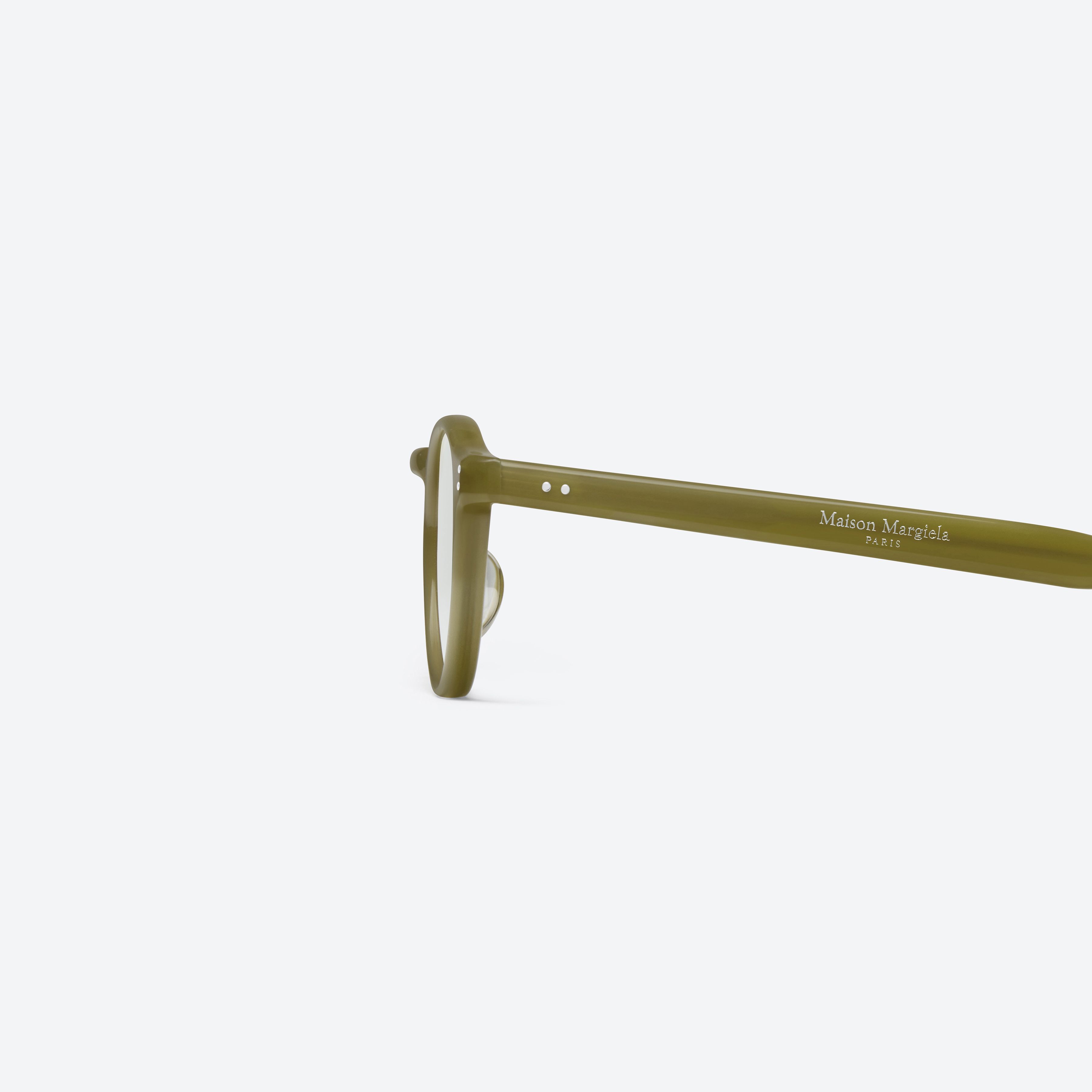 A detailed left view of Gentle Monster Maison Margiela - MM309 GRC7 Green Acetate framed Round sunglasses.