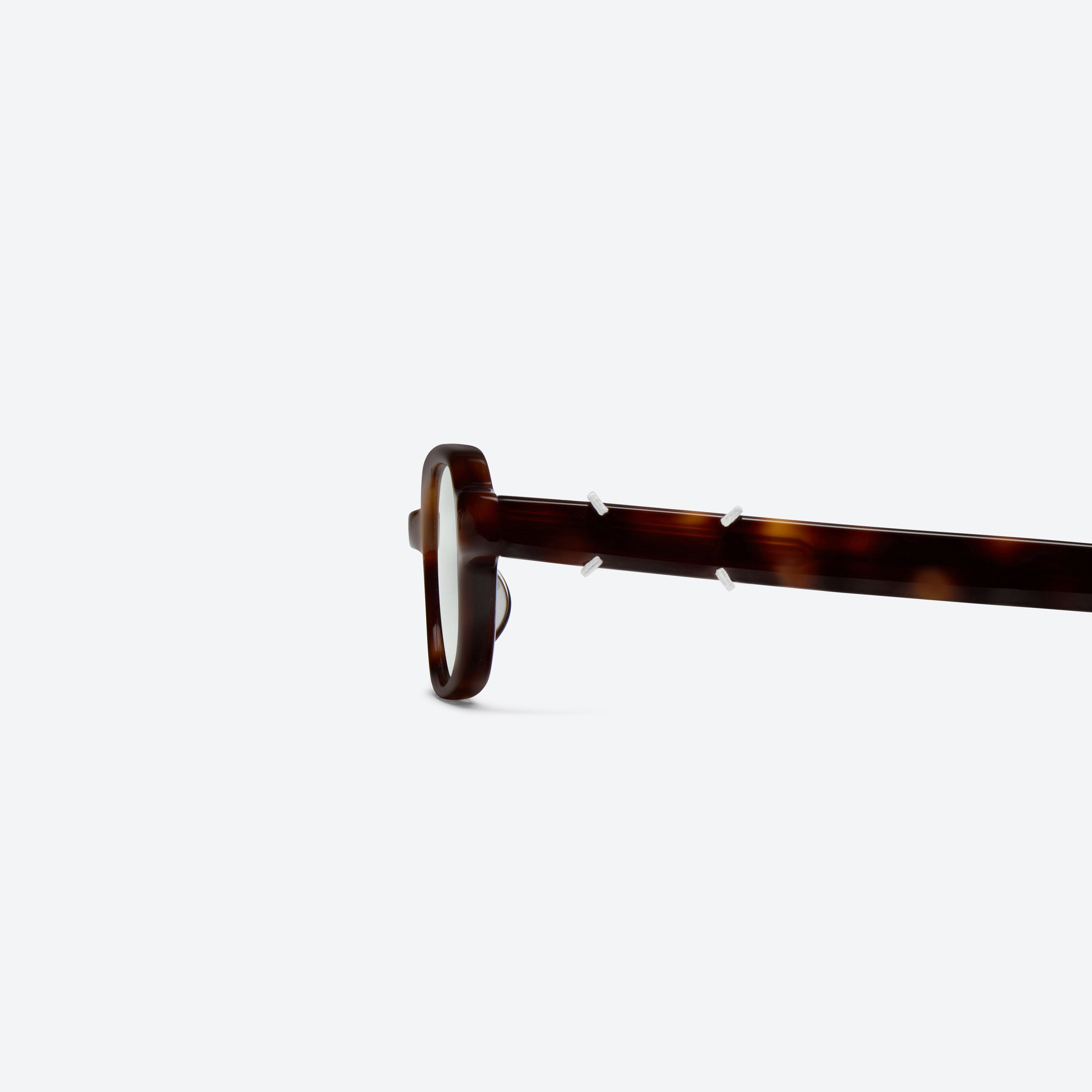 A detailed left view of Gentle Monster Maison Margiela - MM313 L2 Tortoise Acetate framed Square sunglasses.