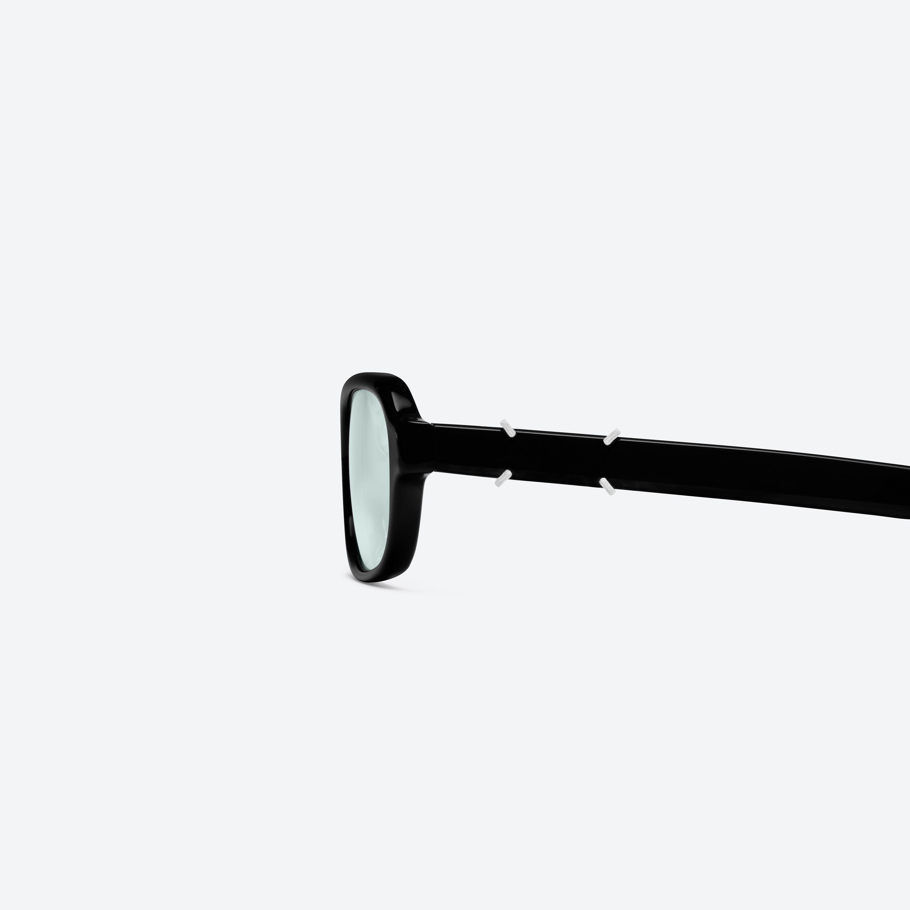 A detailed left view of Gentle Monster Maison Margiela - MM314 01 Black Acetate framed Aviator sunglasses.