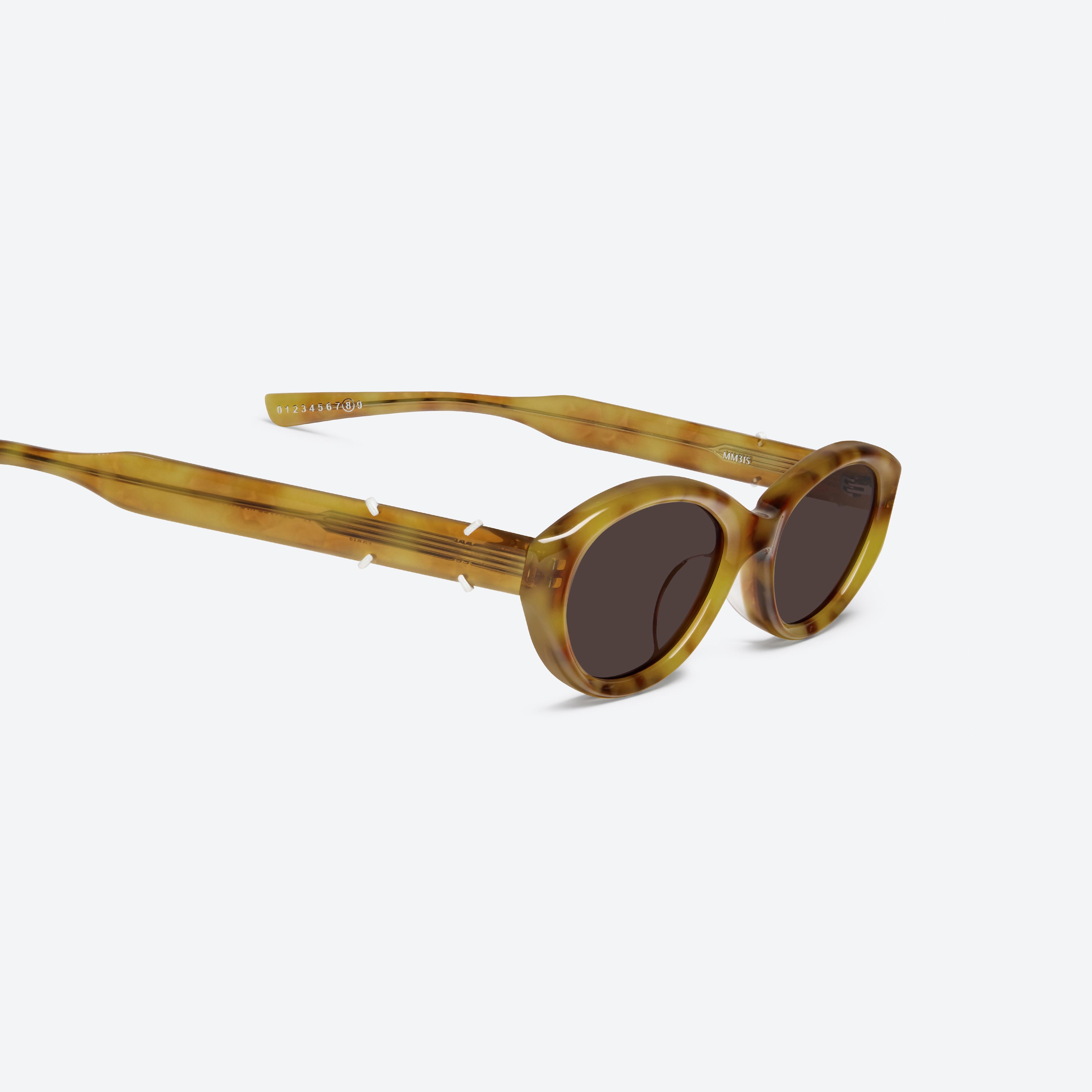 45-degree detailed view of Gentle Monster Maison Margiela - MM315 T12 Tortoise Acetate framed Oval sunglasses.