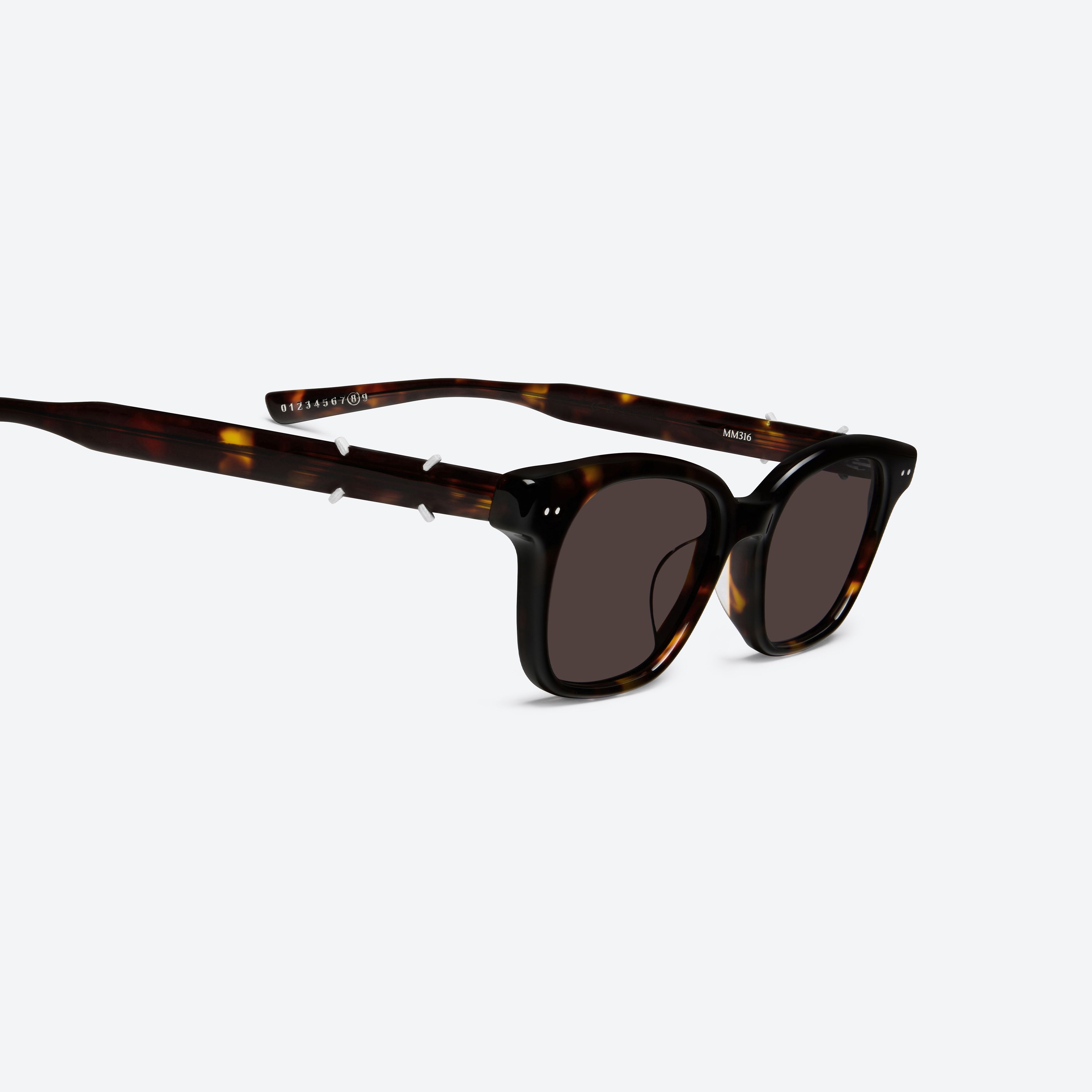 45-degree detailed view of Gentle Monster Maison Margiela - MM316 T1 Tortoise Acetate framed Square sunglasses.