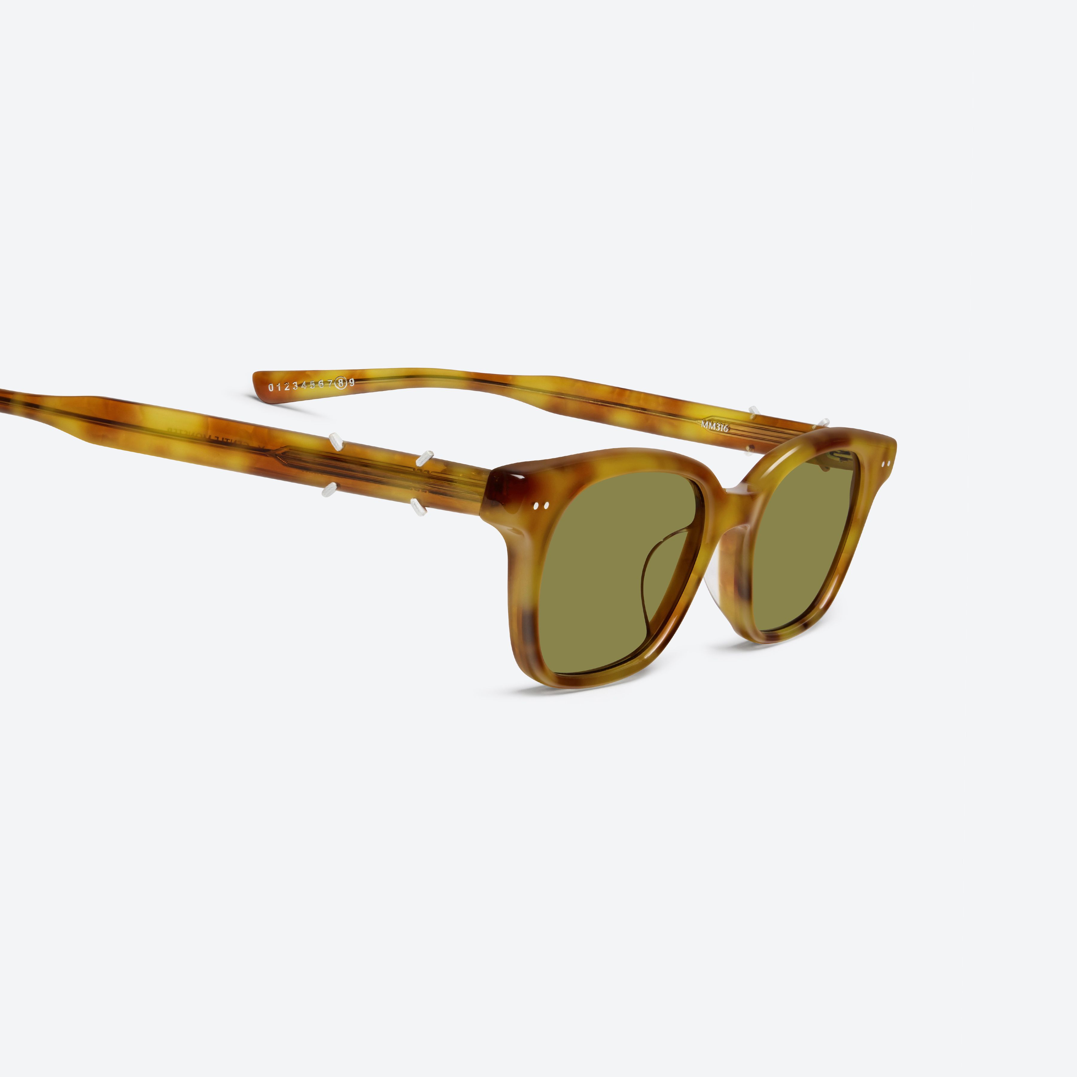 45-degree detailed view of Gentle Monster Maison Margiela - MM316 T12 Tortoise Acetate framed Square sunglasses.