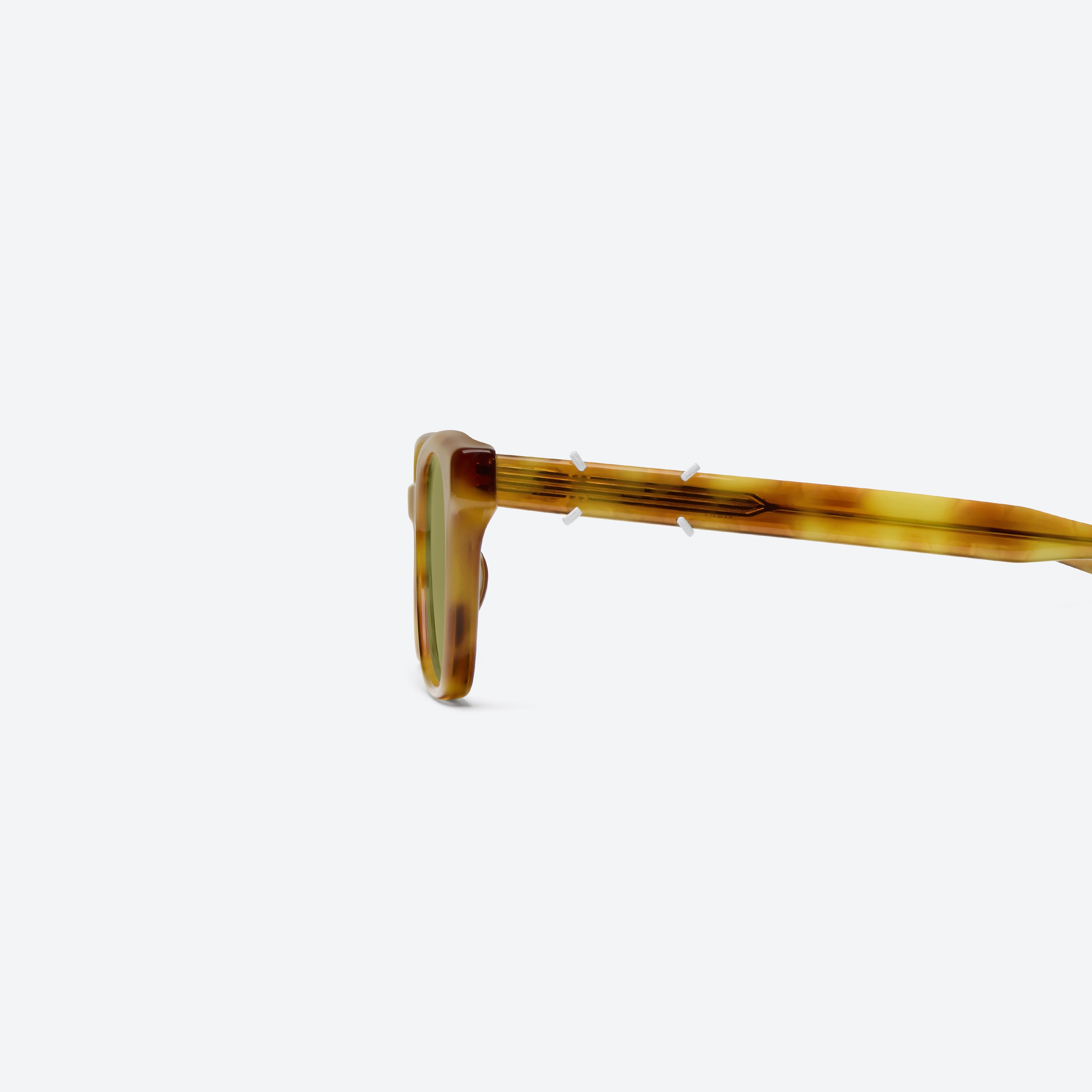 A detailed left view of Gentle Monster Maison Margiela - MM316 T12 Tortoise Acetate framed Square sunglasses.