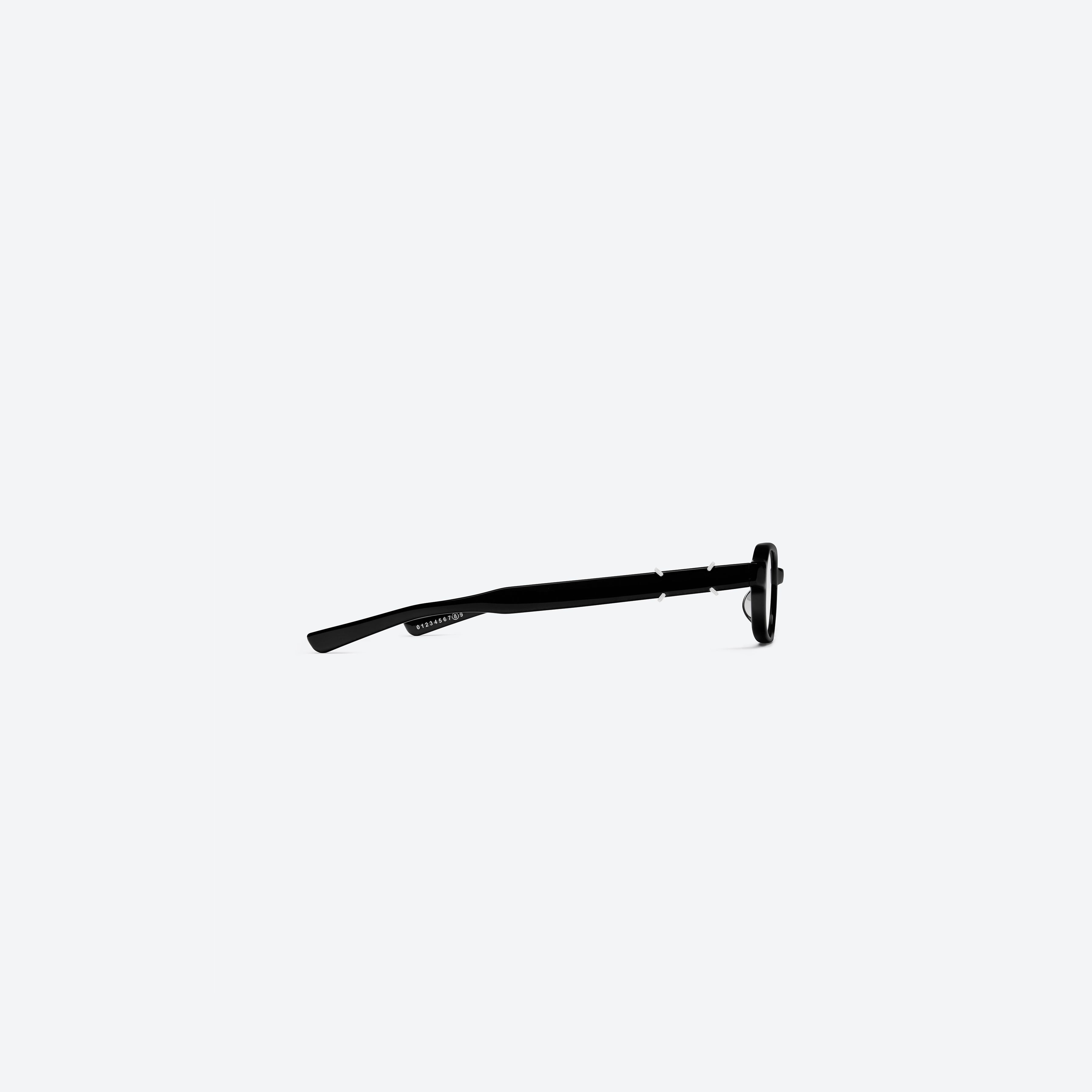 A detailed right view of Gentle Monster Maison Margiela - MM313 01 Black Acetate framed Square glasses.