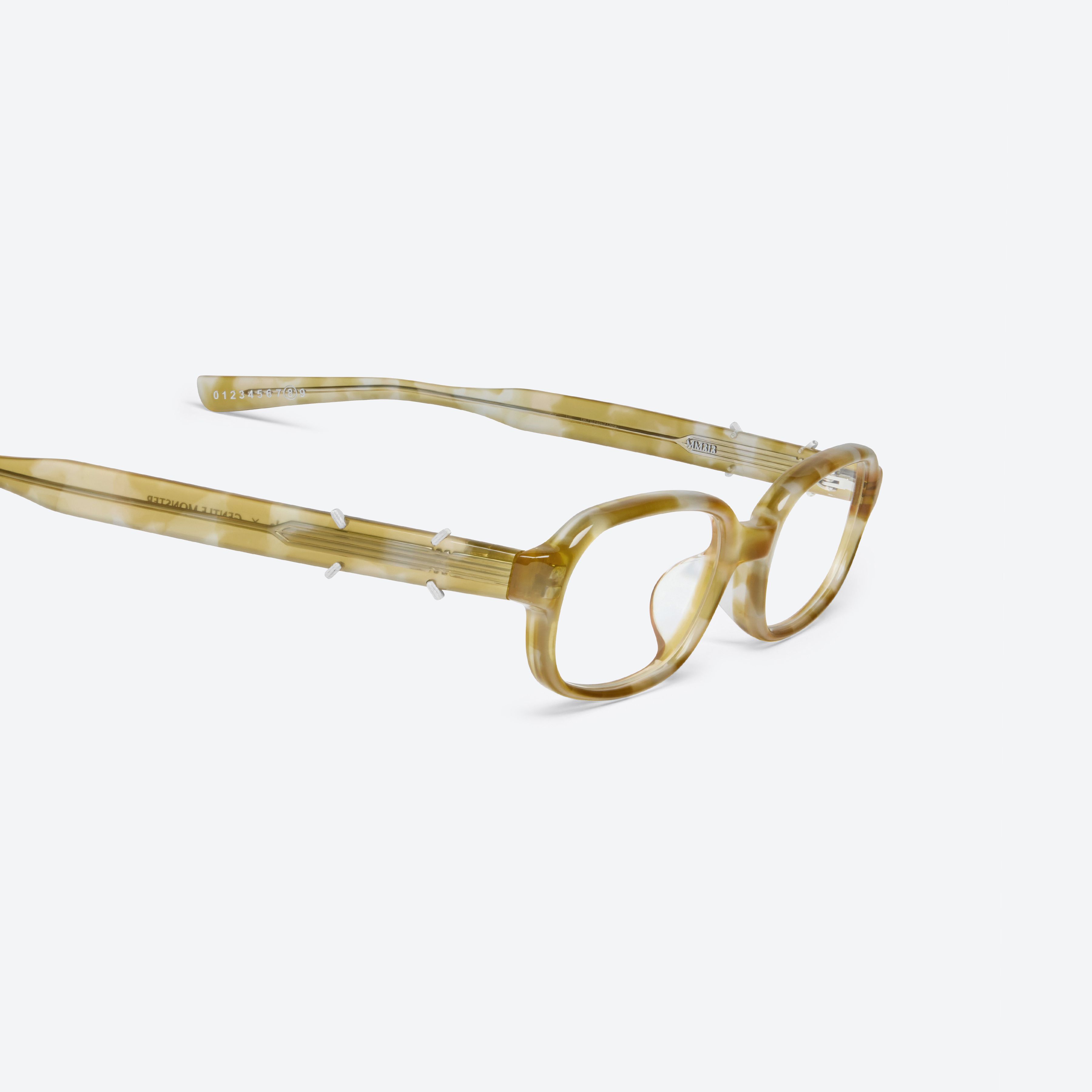 45-degree detailed view of Gentle Monster Maison Margiela - MM313 T13 Tortoise Acetate framed Square glasses.