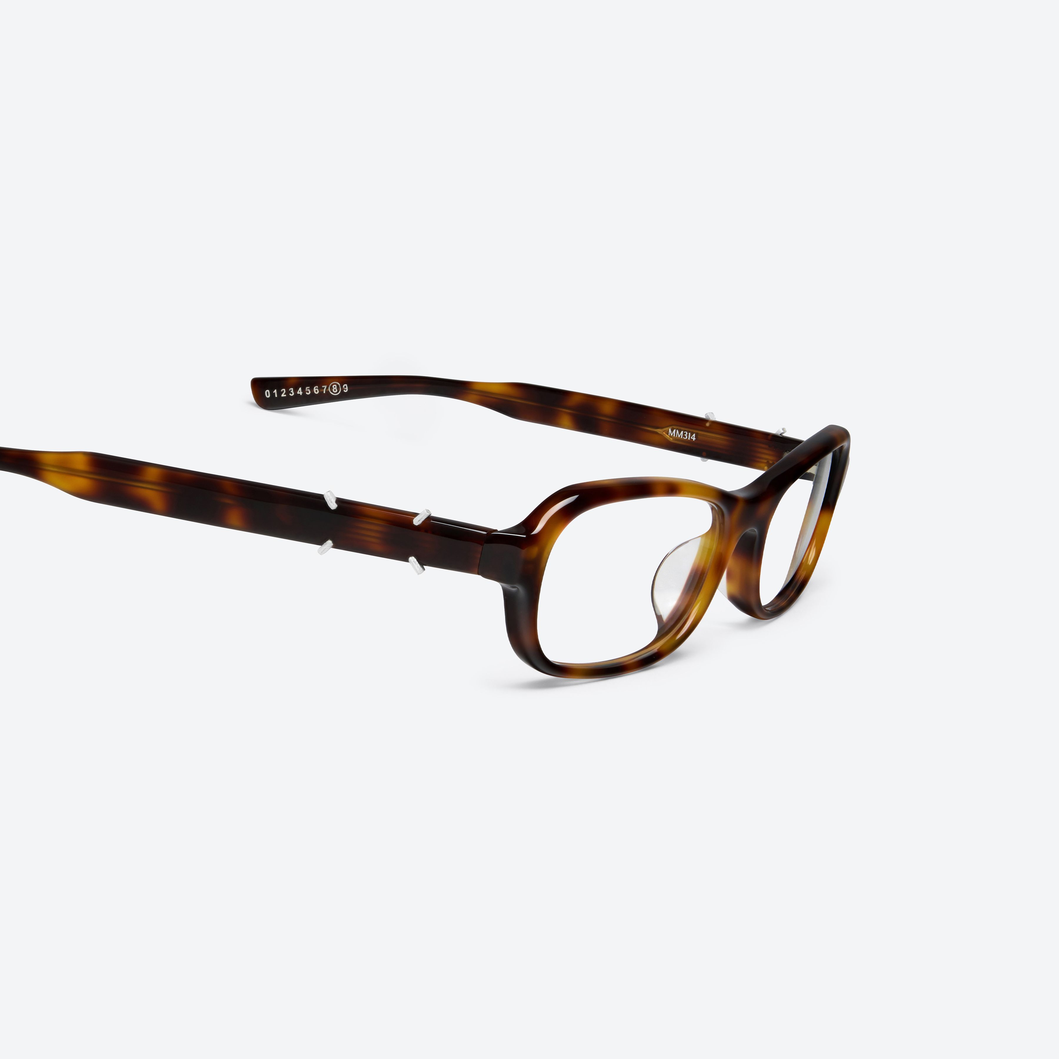 45-degree detailed view of Gentle Monster Maison Margiela - MM314 L2 Tortoise Acetate framed Aviator glasses.