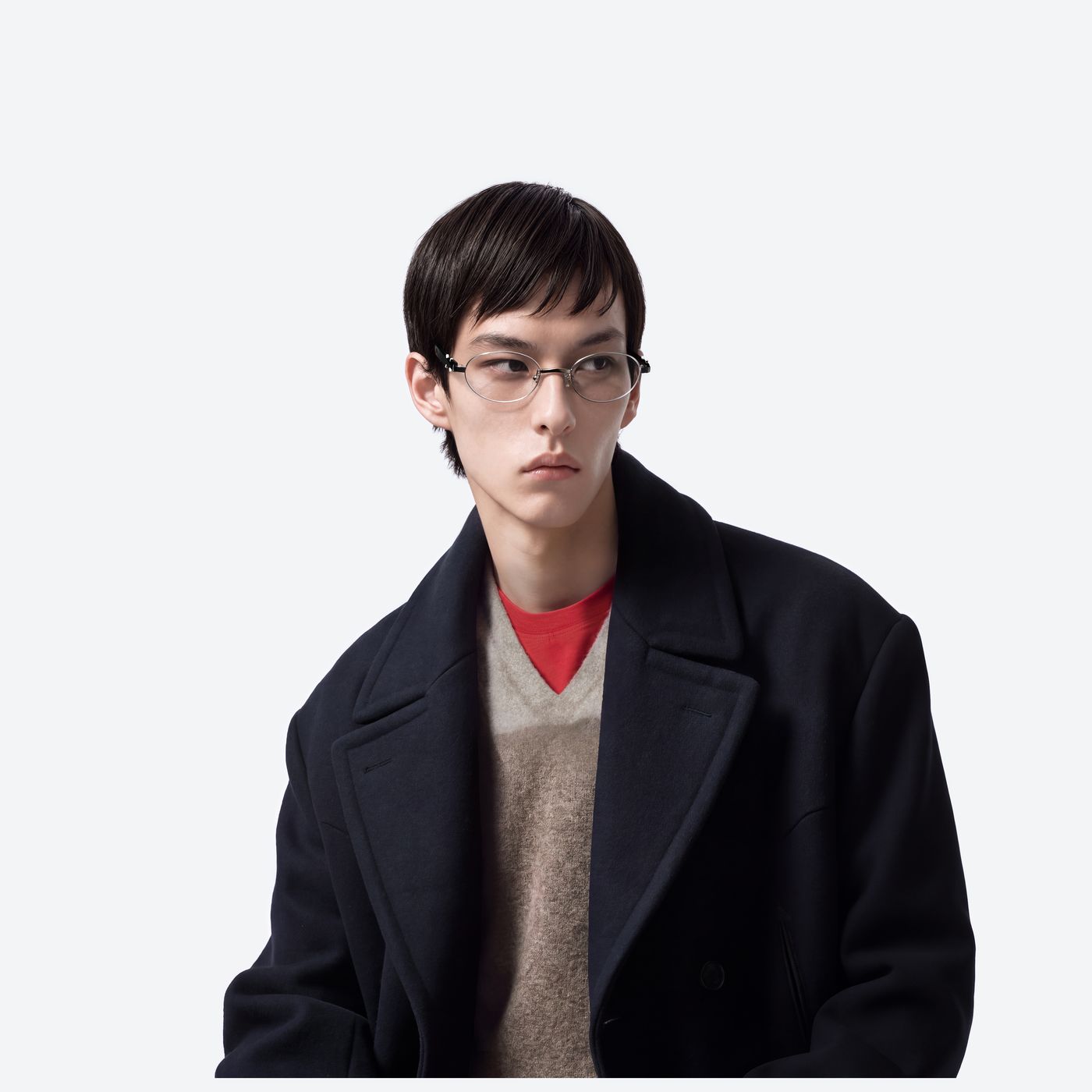 Model wearing the Maison Margiela - MM310 02 Silver Mixed framed Oval glasses.