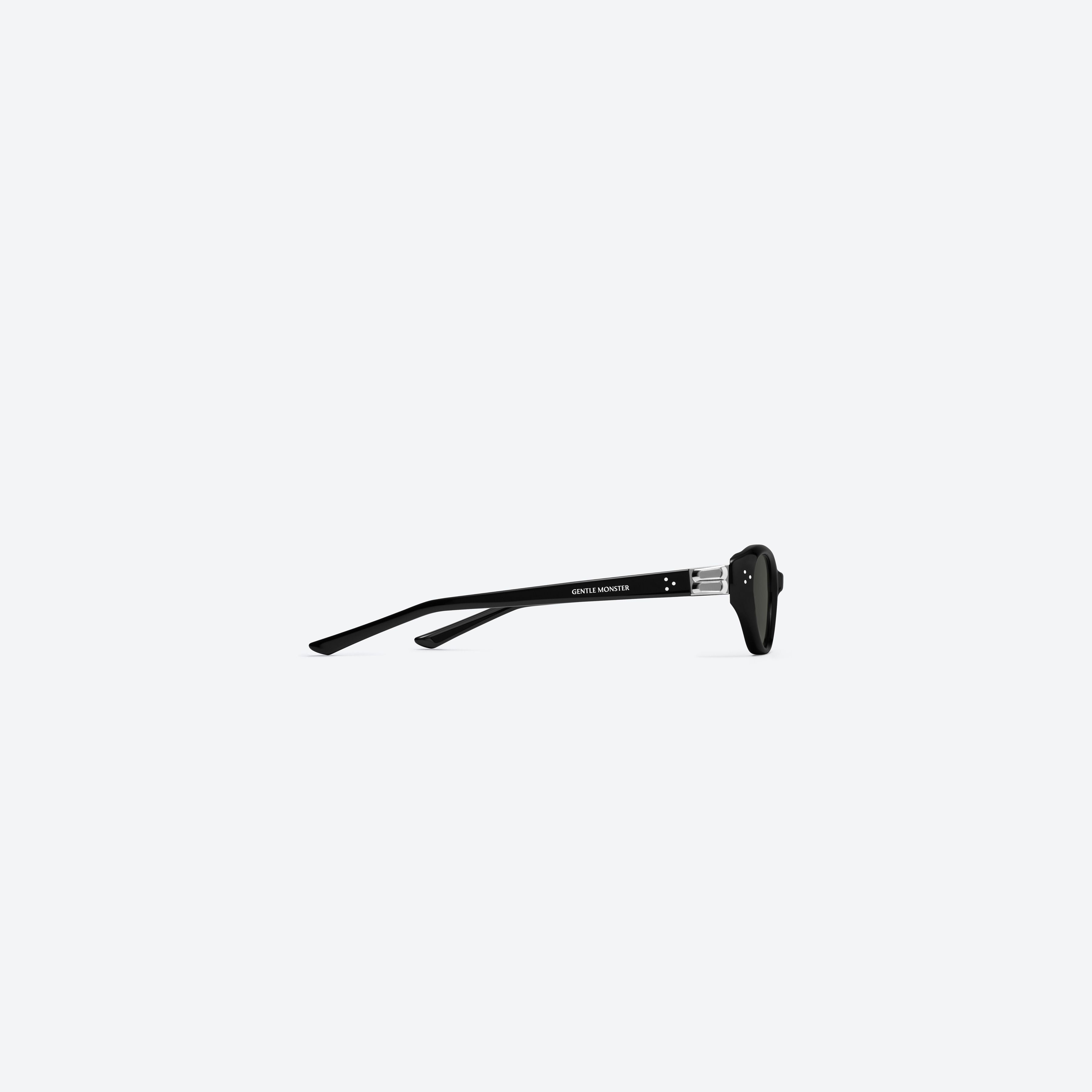 A detailed right view of Gentle Monster Vanilla 01 Recycled Similar Black Acetate Renew framed Cat-eye sunglasses.