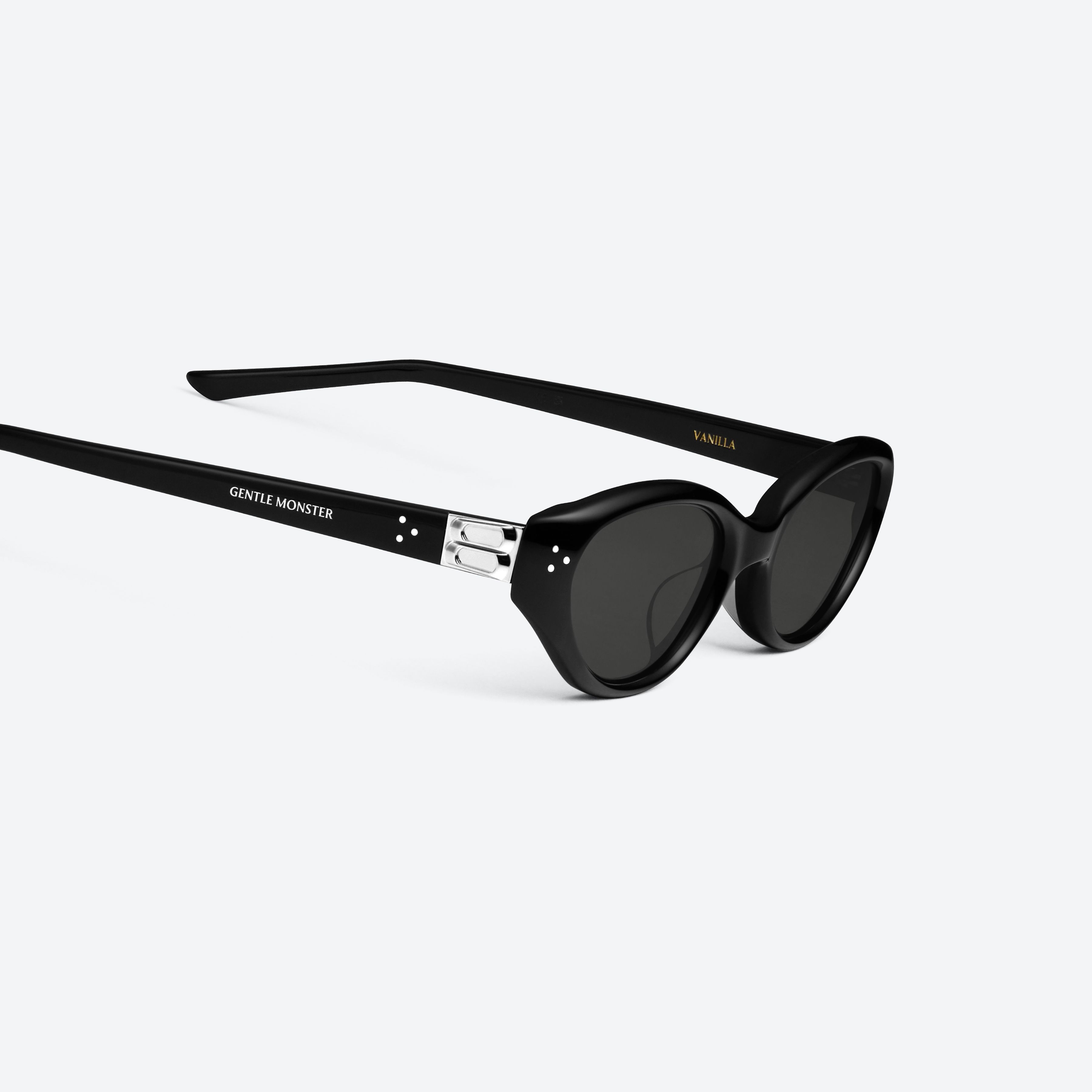 45-degree detailed view of Gentle Monster Vanilla 01 Recycled Similar Black Acetate Renew framed Cat-eye sunglasses.