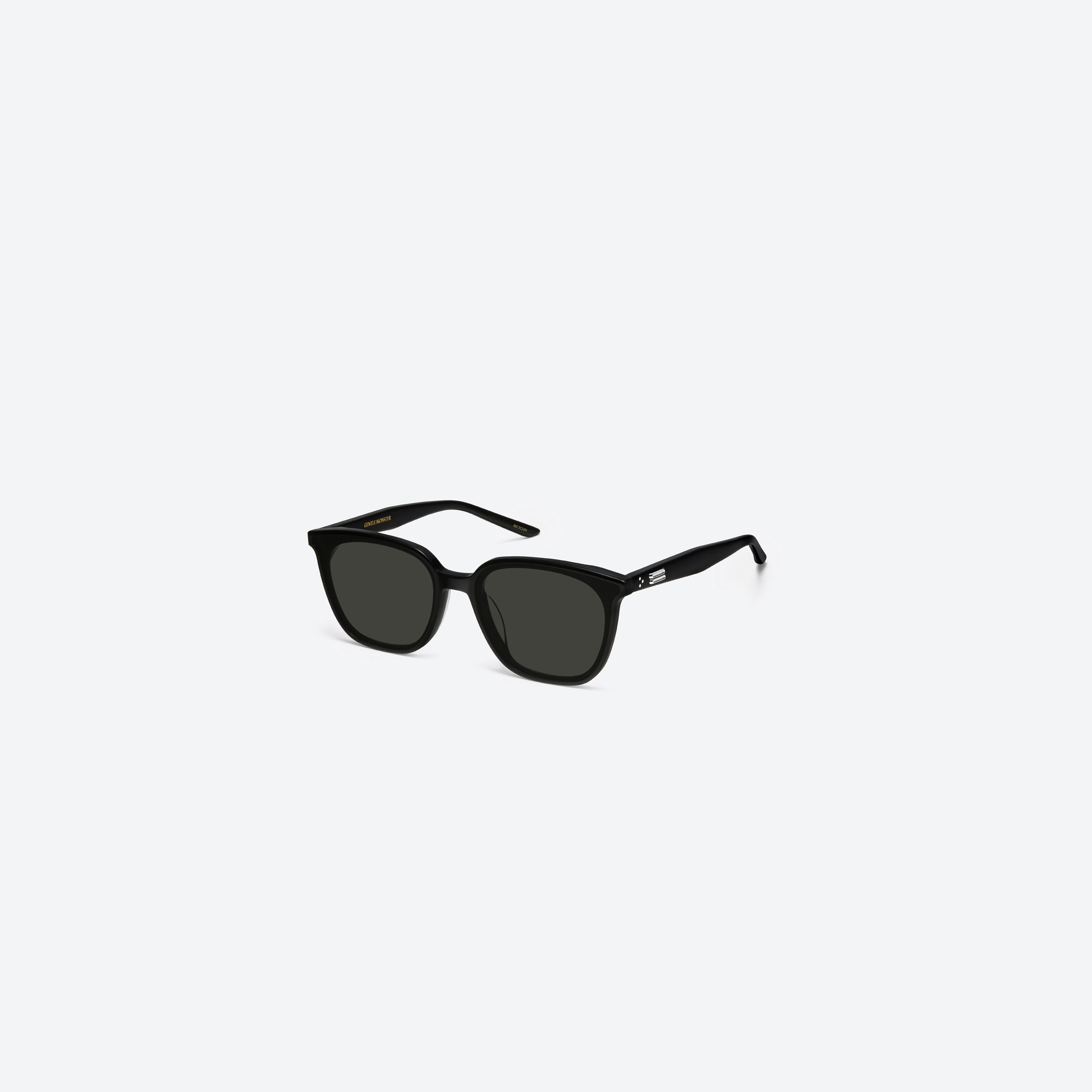 45-degree view of Gentle Monster Alma 01 Recycled Similar Black Acetate Renew framed Square sunglasses.