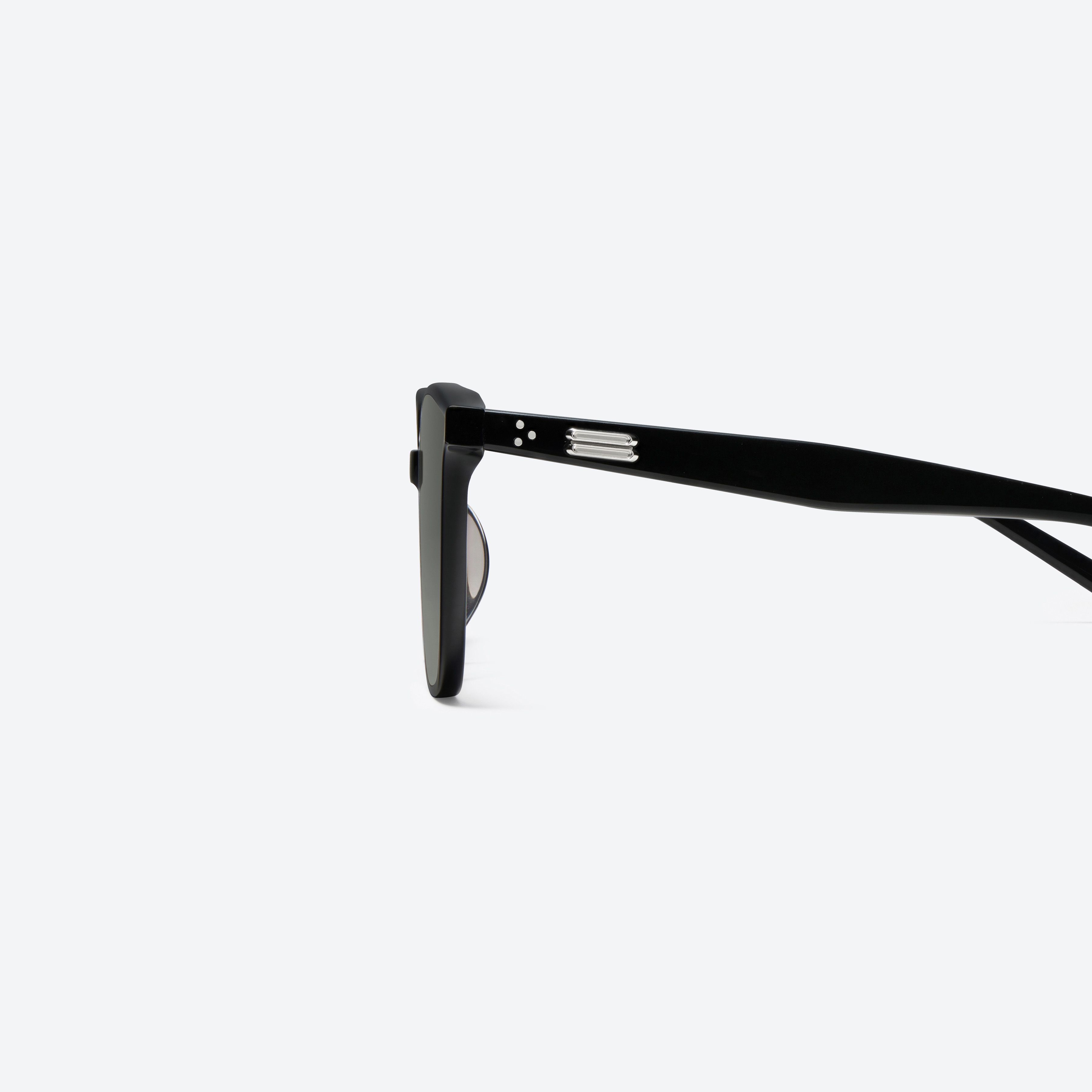A detailed left view of Gentle Monster Alma 01 Recycled Similar Black Acetate Renew framed Square sunglasses.