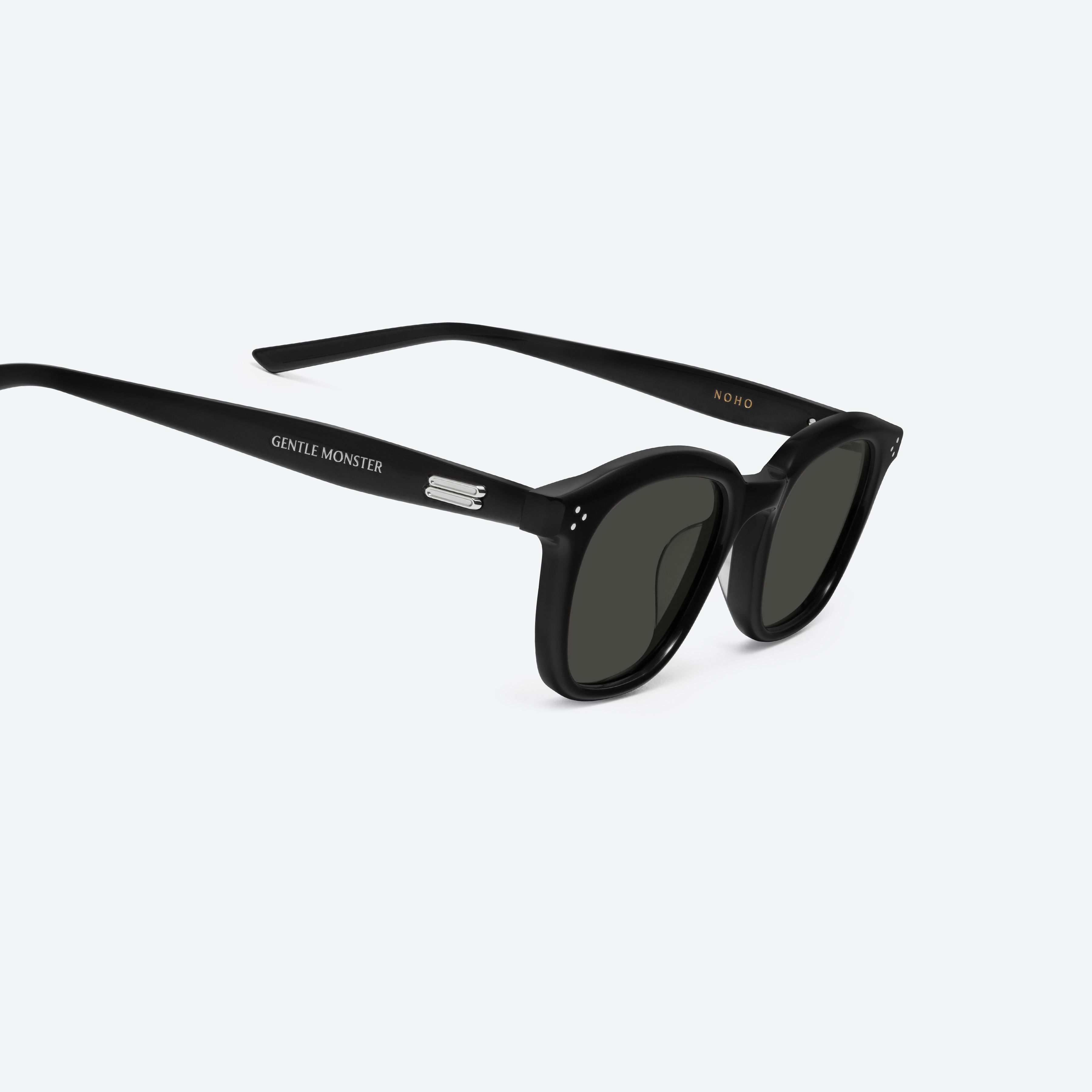 45-degree detailed view of Gentle Monster Noho 01 Recycled Similar Black Acetate Renew framed Round sunglasses.