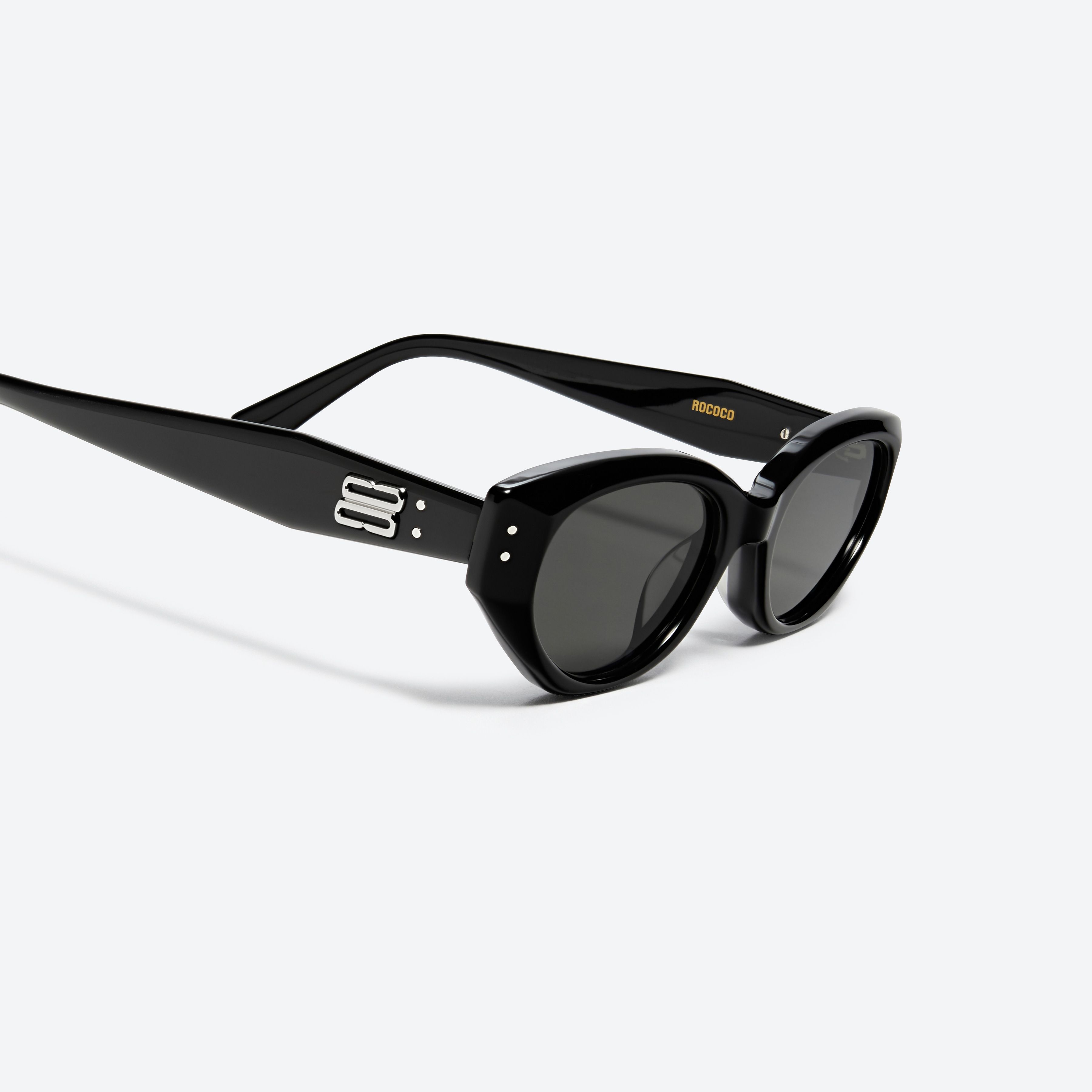 45-degree detailed view of Gentle Monster Rococo 01 Recycled Similar Black Acetate Renew framed Cat-eye sunglasses.