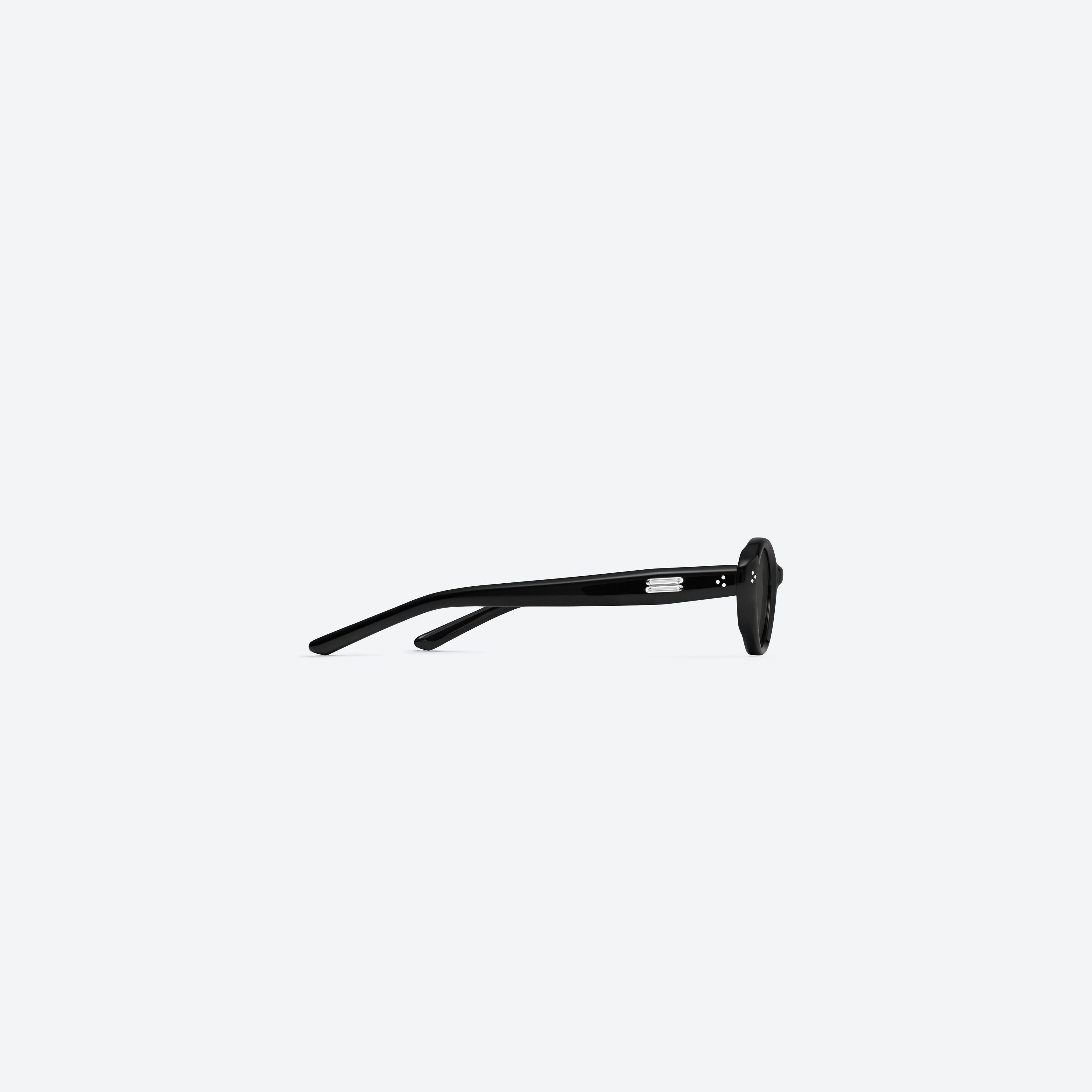 A detailed right view of Gentle Monster Cuscus 01 Recycled Similar Black Acetate Renew framed Oval sunglasses.