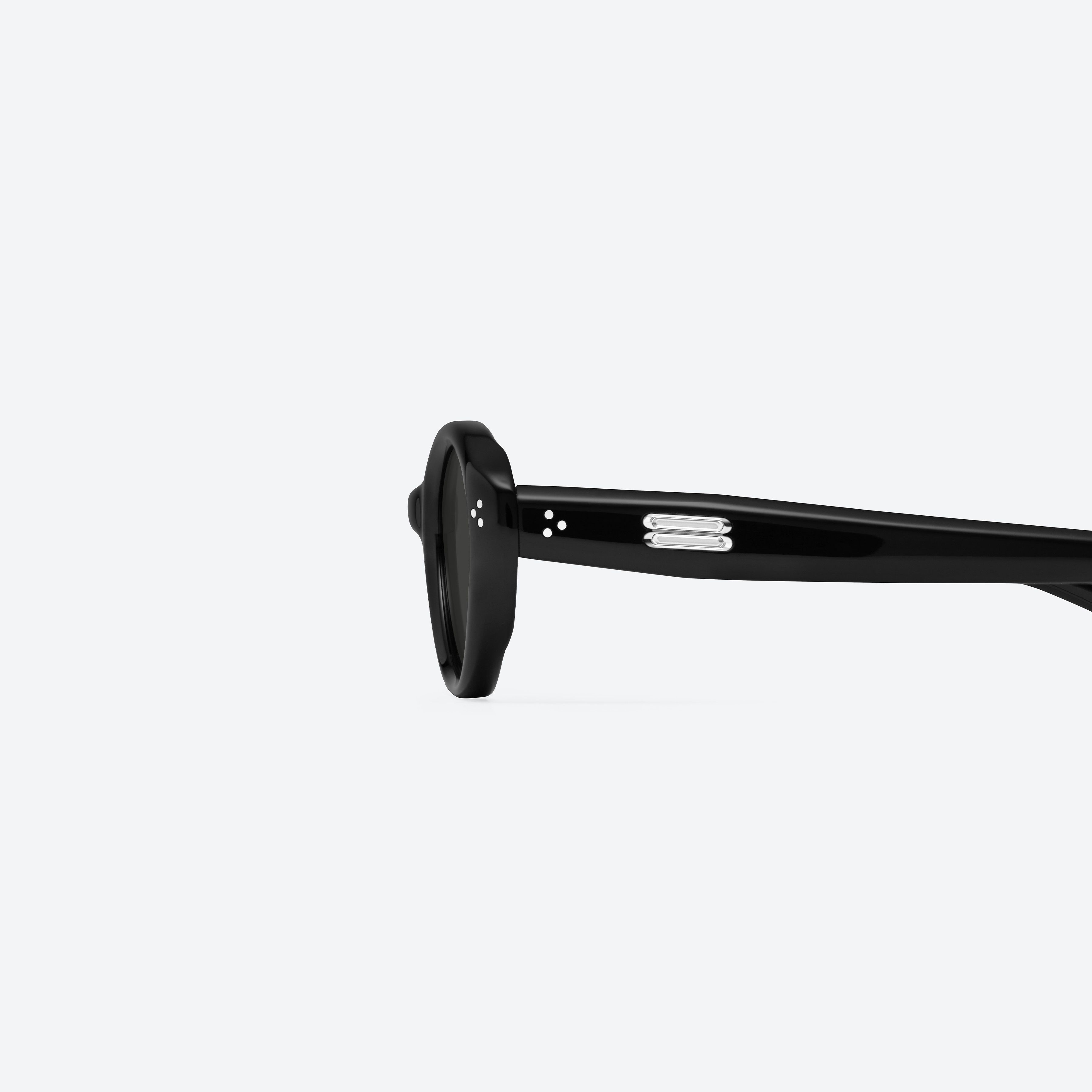 A detailed left view of Gentle Monster Cuscus 01 Recycled Similar Black Acetate Renew framed Oval sunglasses.