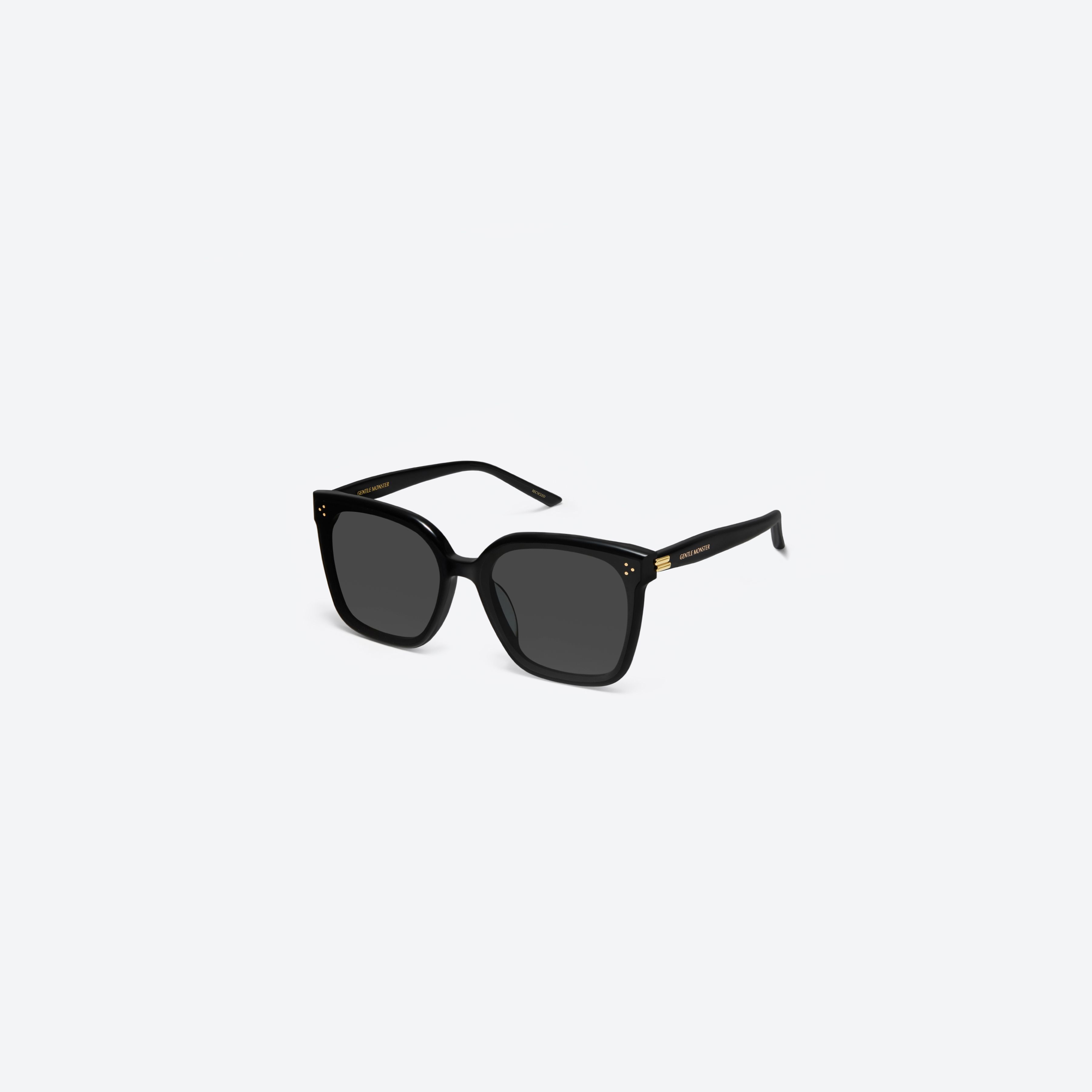 45-degree view of Gentle Monster New Her 01 Recycled Similar Black Acetate Renew framed Square sunglasses.