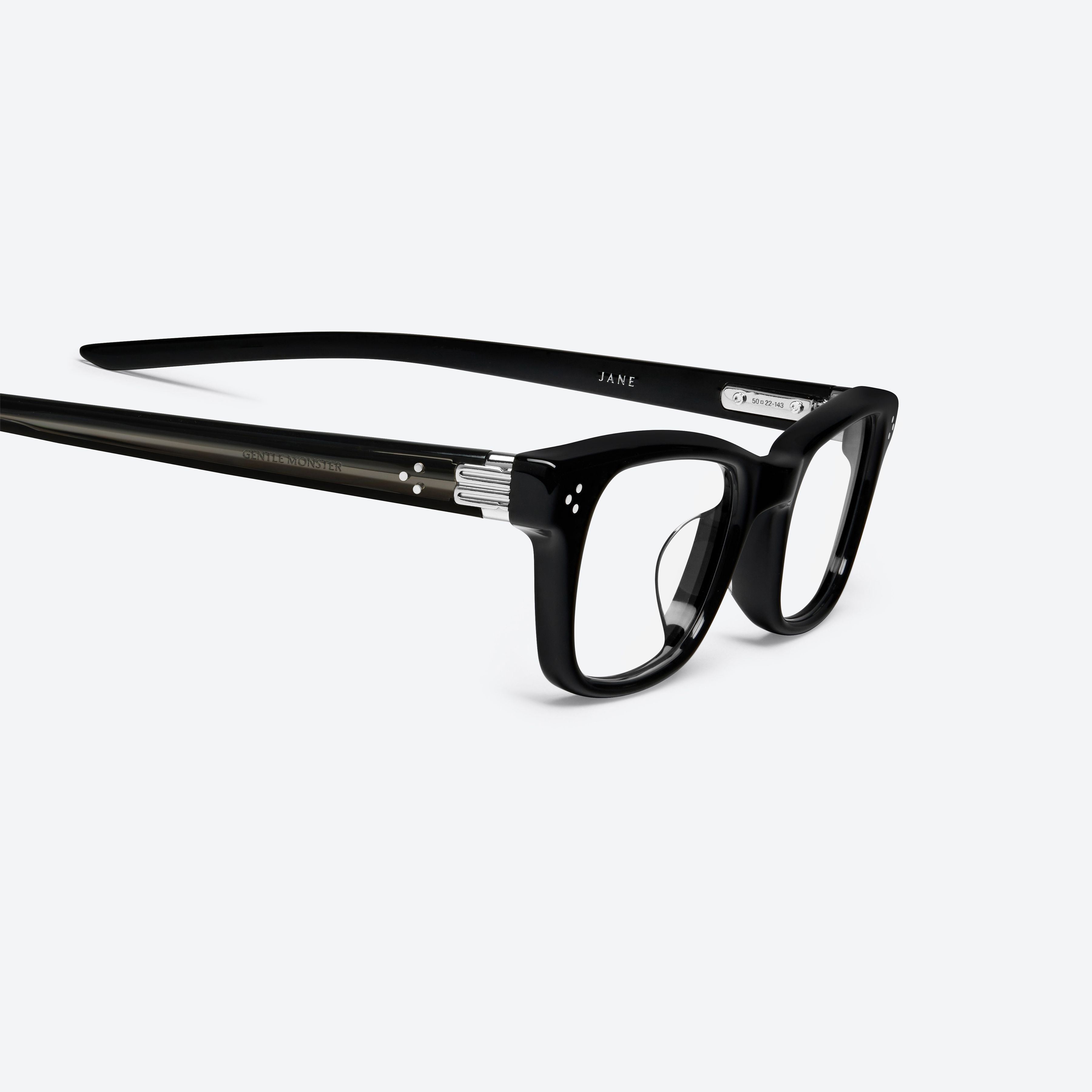 45-degree detailed view of Gentle Monster Jane 01 Black Acetate framed Cat-eye glasses.