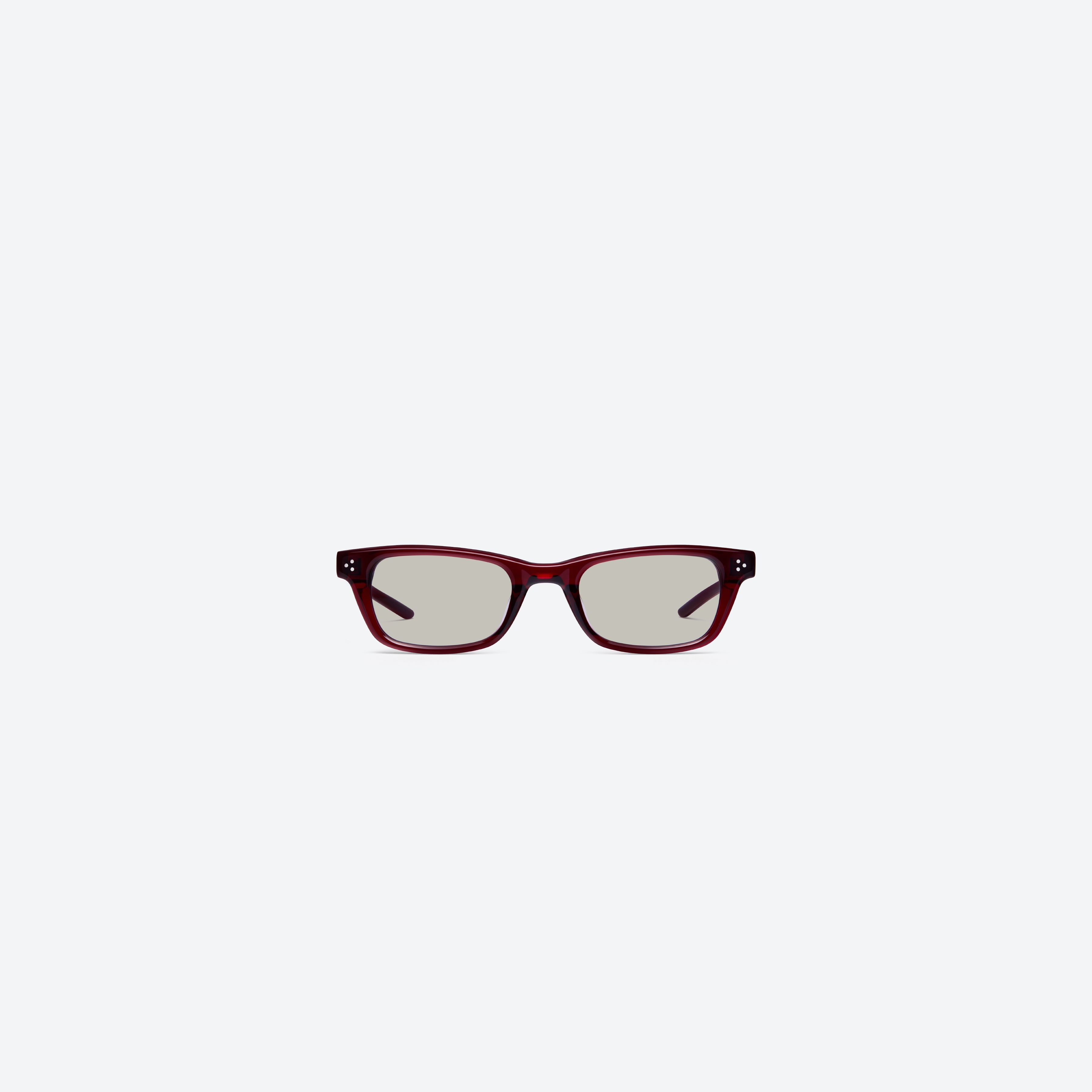 A front view of Gentle Monster Jane Rc7 Red Acetate framed Cat-eye sunglasses.