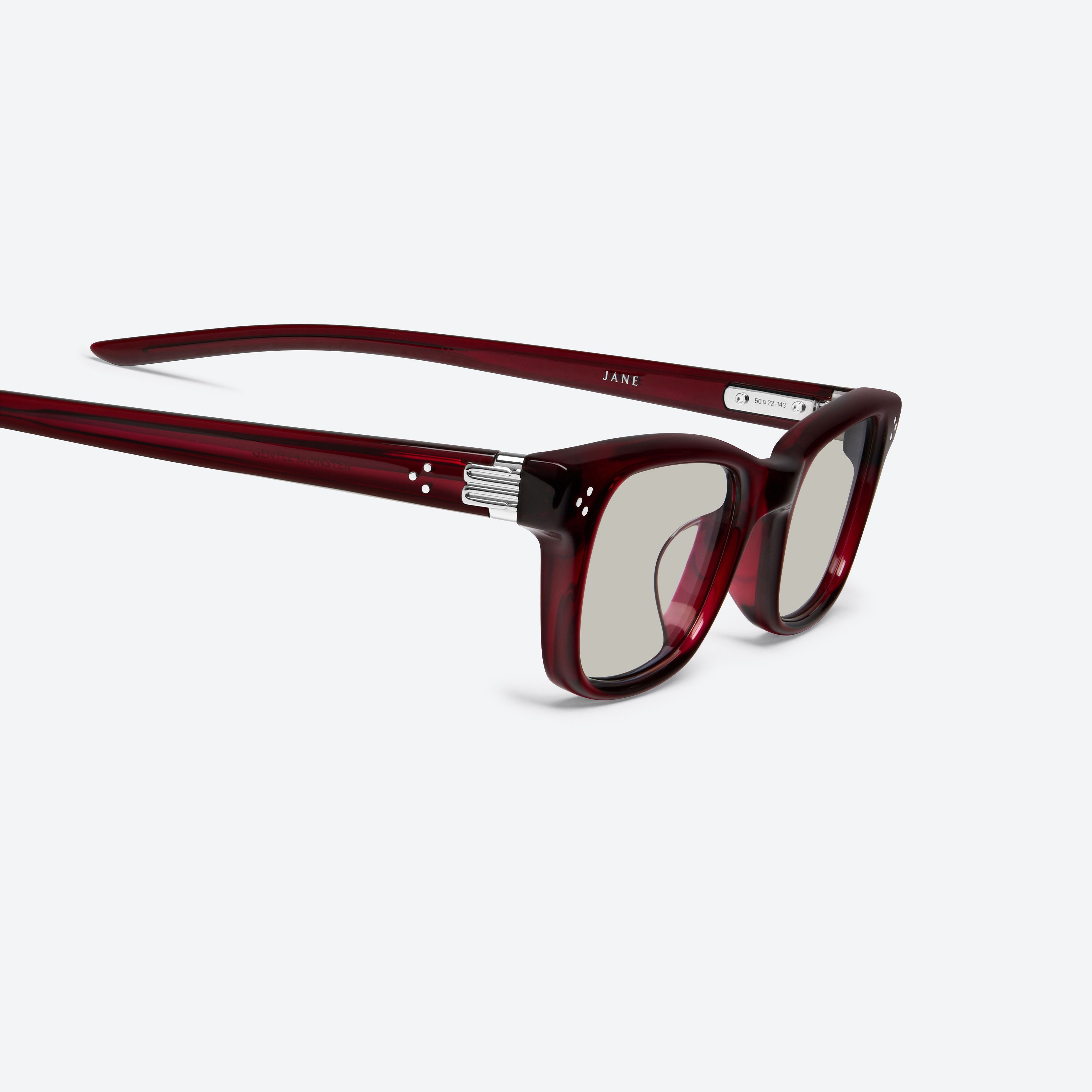45-degree detailed view of Gentle Monster Jane Rc7 Red Acetate framed Cat-eye sunglasses.