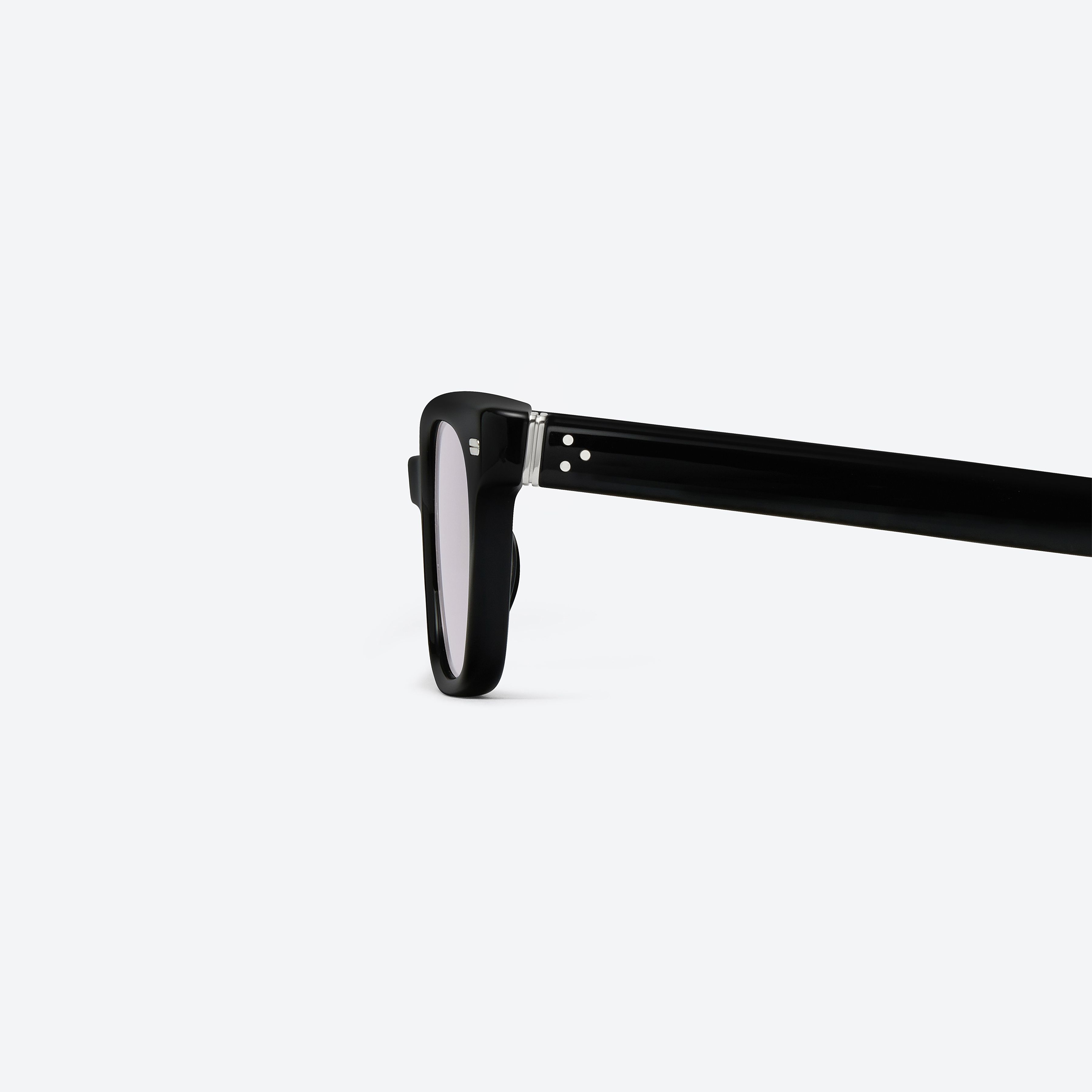 A detailed left view of Gentle Monster Ade 01(v) Black Acetate framed Square sunglasses.