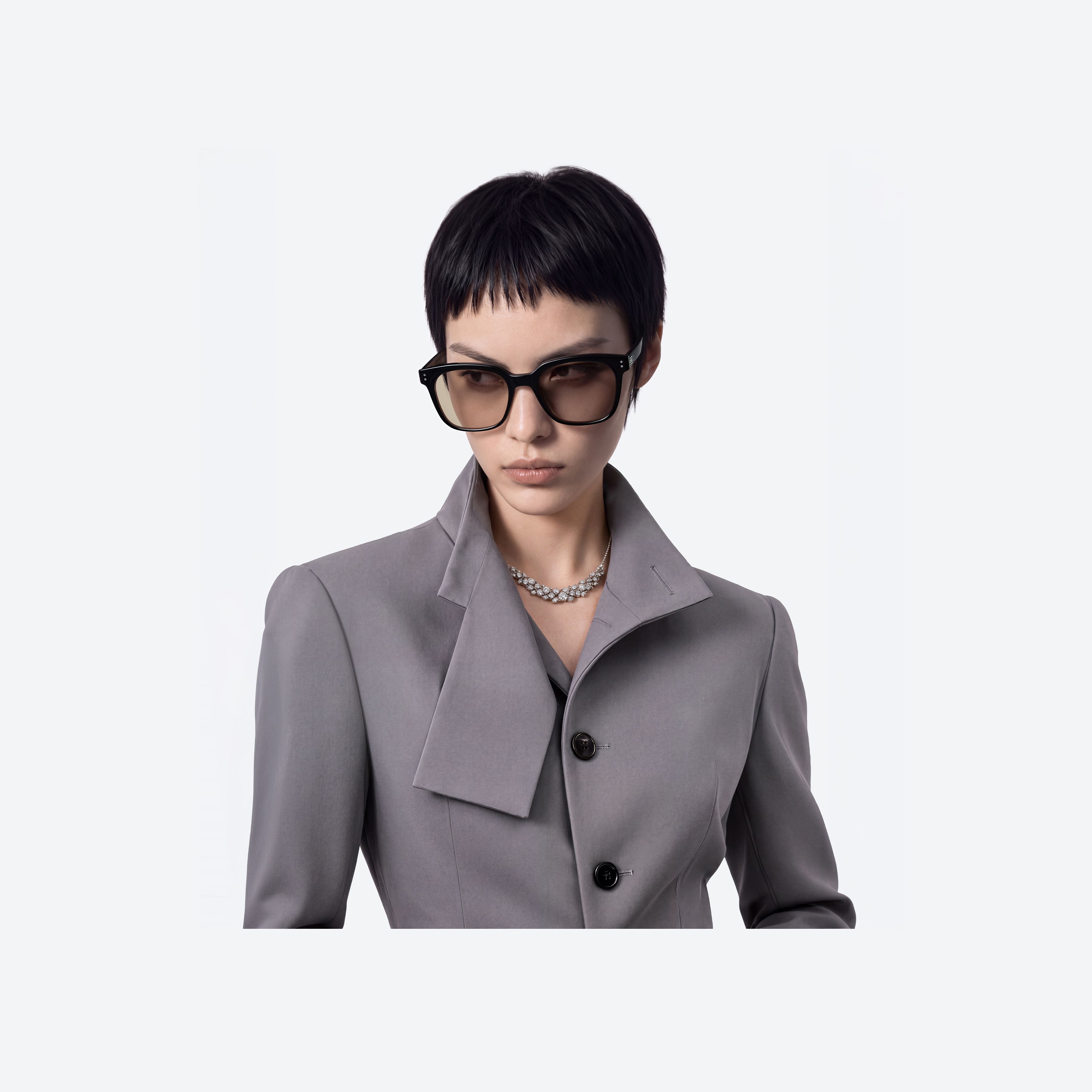 Model wearing the Una.c W 01(br) Black Acetate framed Square sunglasses.