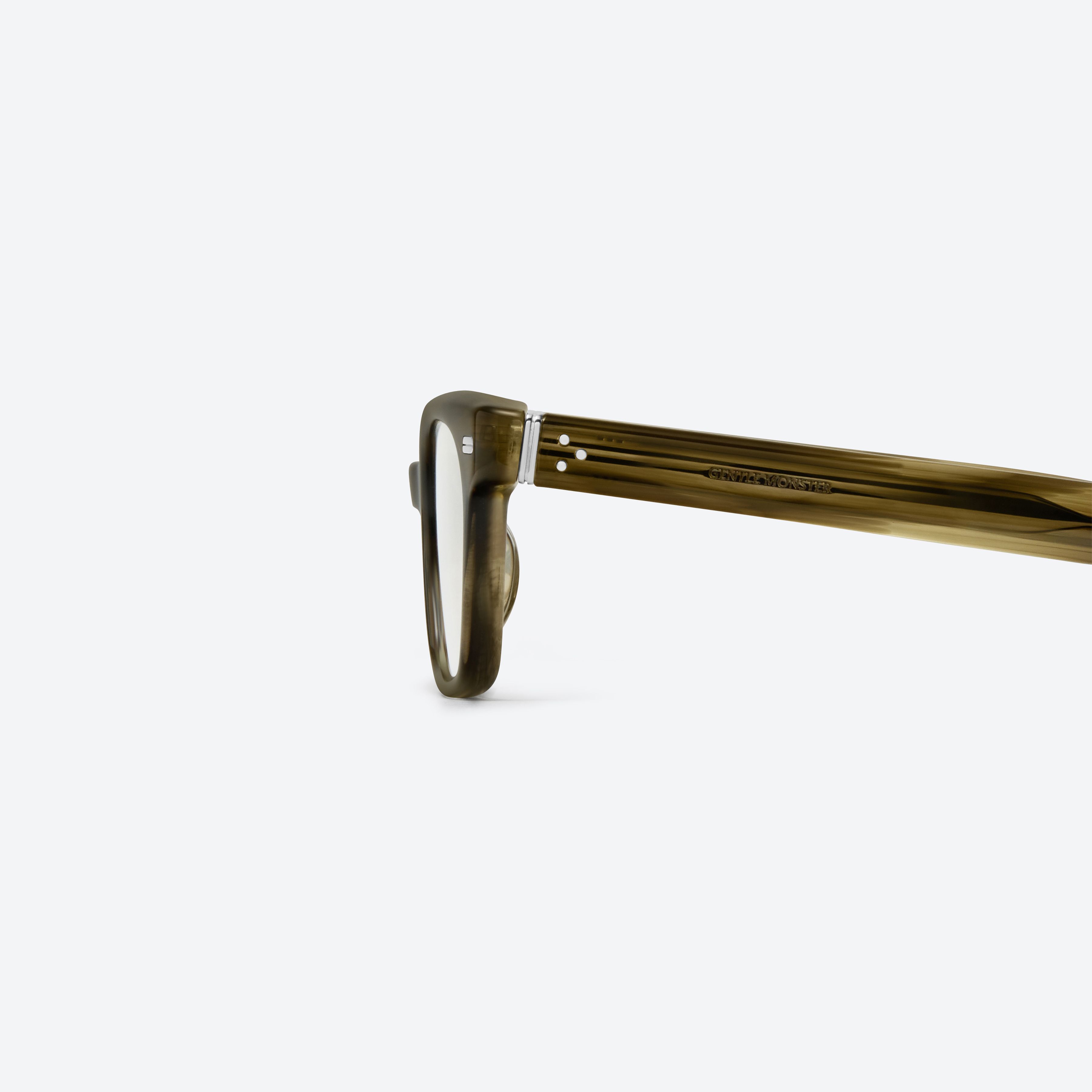 A detailed left view of Gentle Monster Ade Kdc2 Multicolored Acetate framed Square glasses.