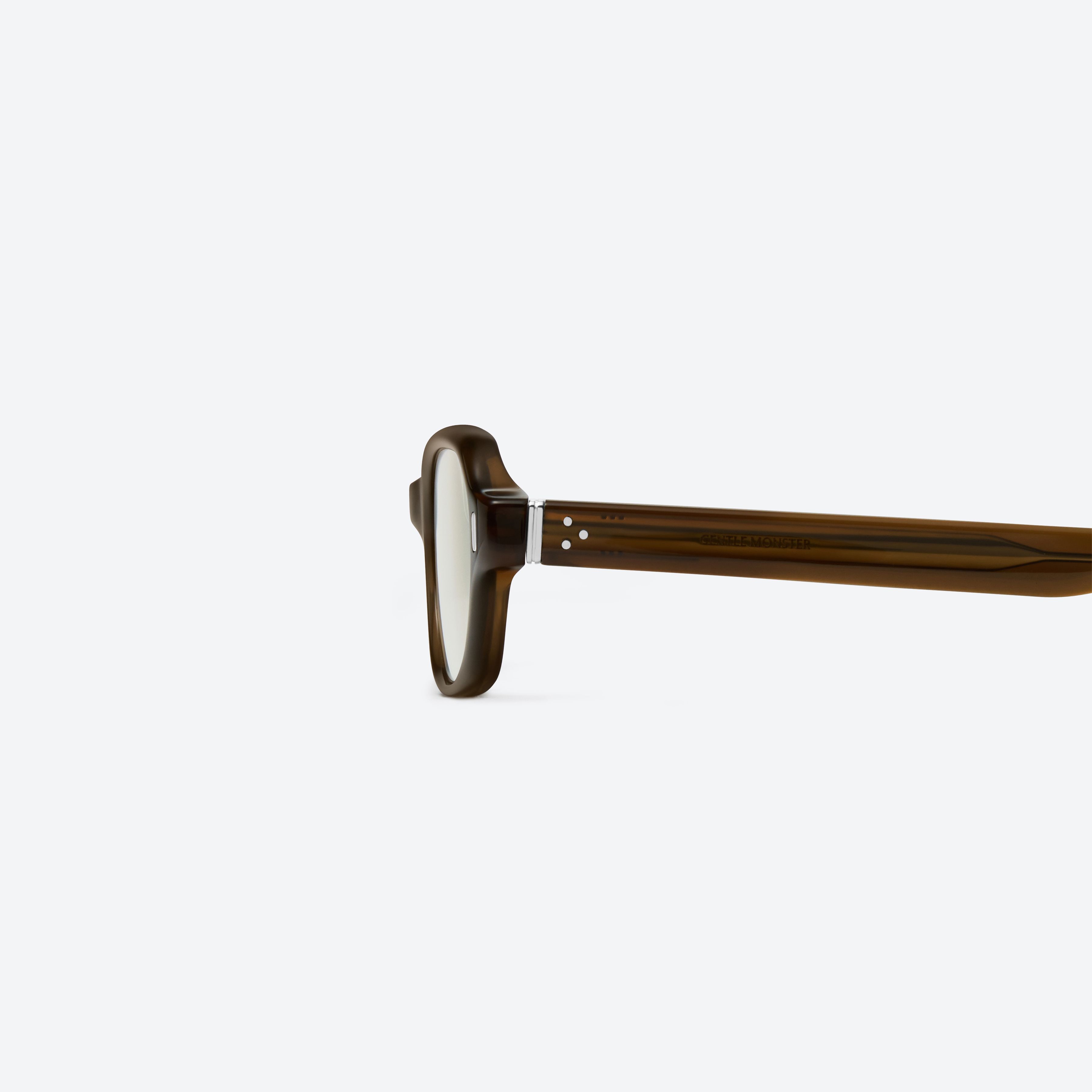 A detailed left view of Gentle Monster Cai Dbc1 Similar Brown Acetate framed Aviator sunglasses.