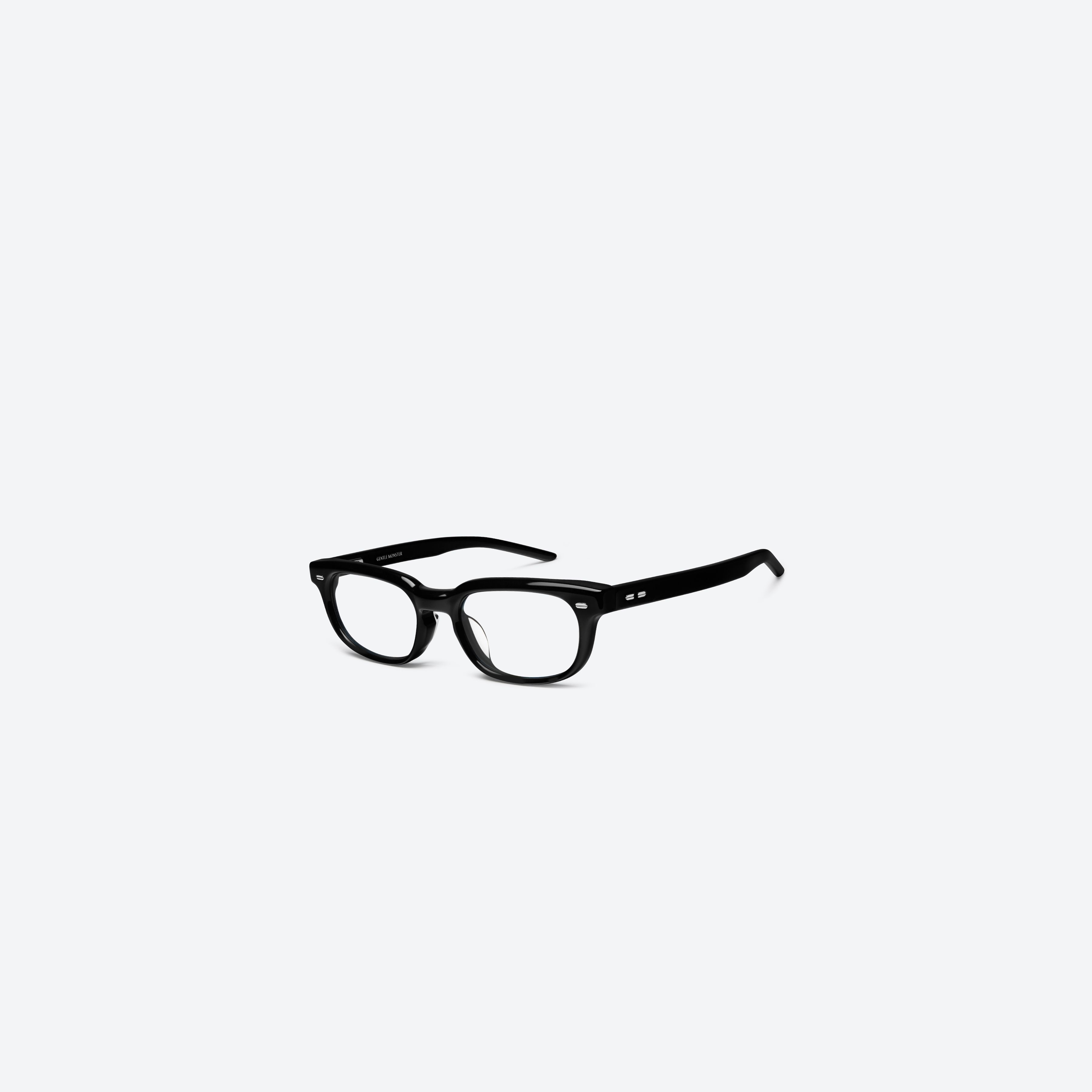 45-degree view of Gentle Monster Magg 01 Black Acetate framed Round glasses.