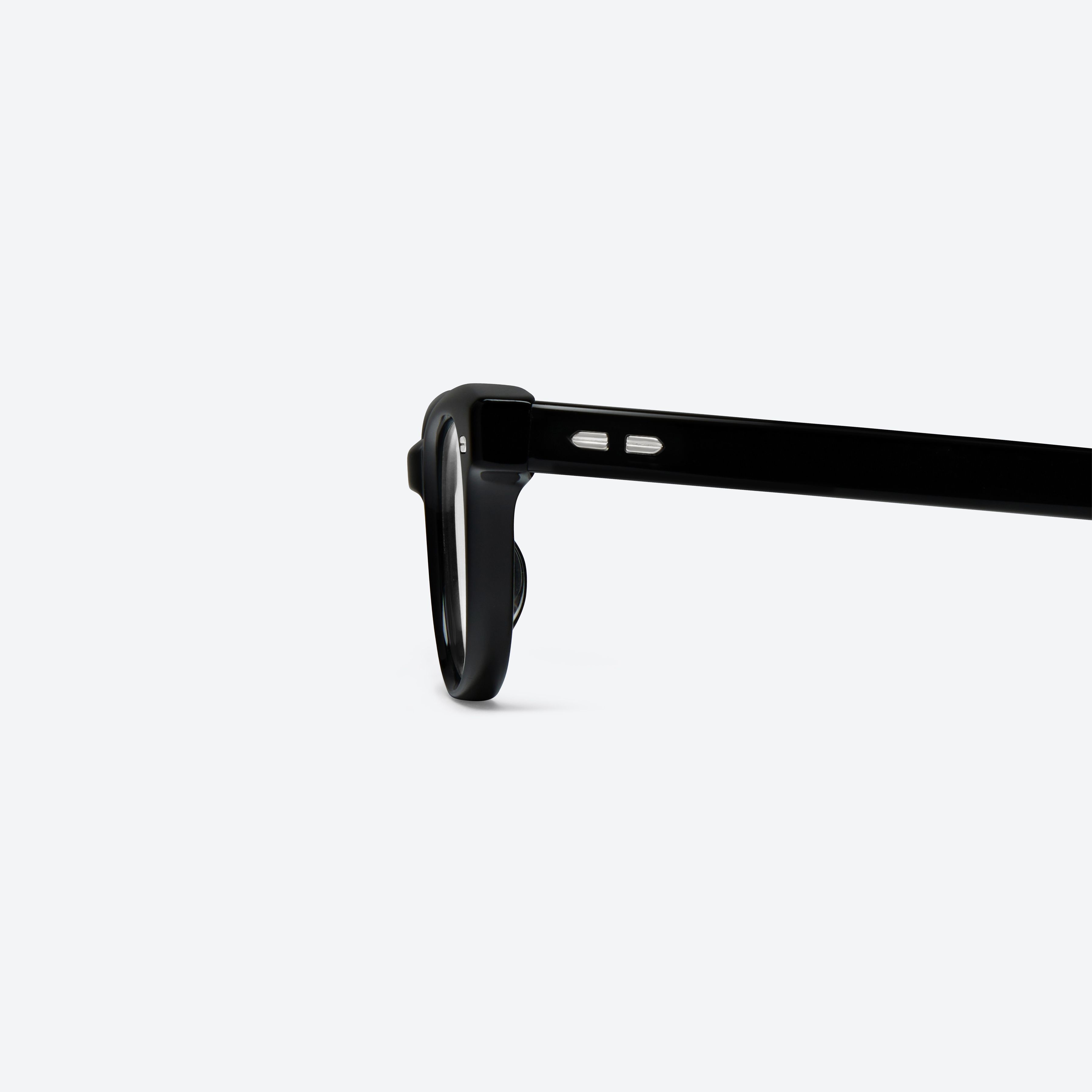 A detailed left view of Gentle Monster Magg 01 Black Acetate framed Round glasses.