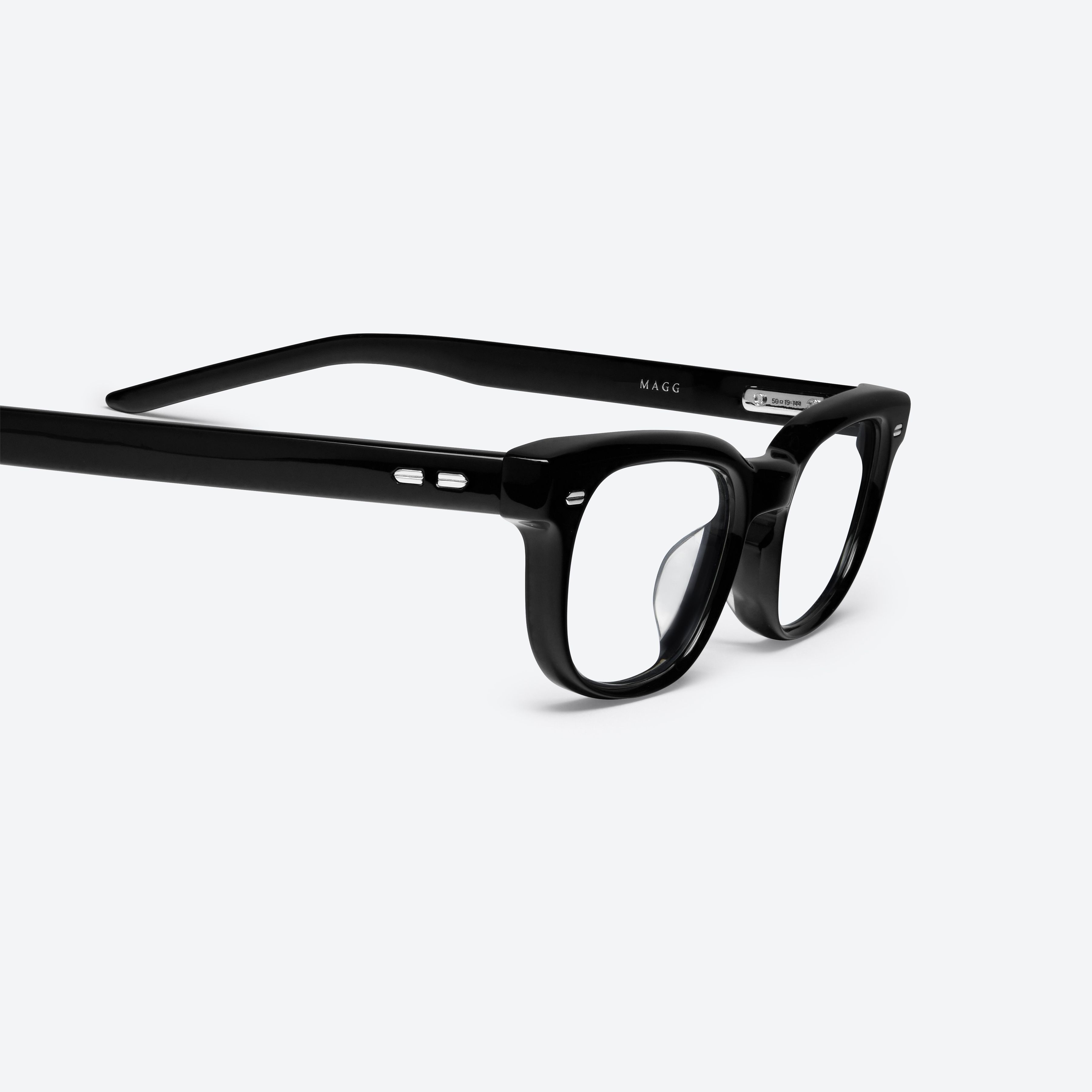 45-degree detailed view of Gentle Monster Magg 01 Black Acetate framed Round glasses.