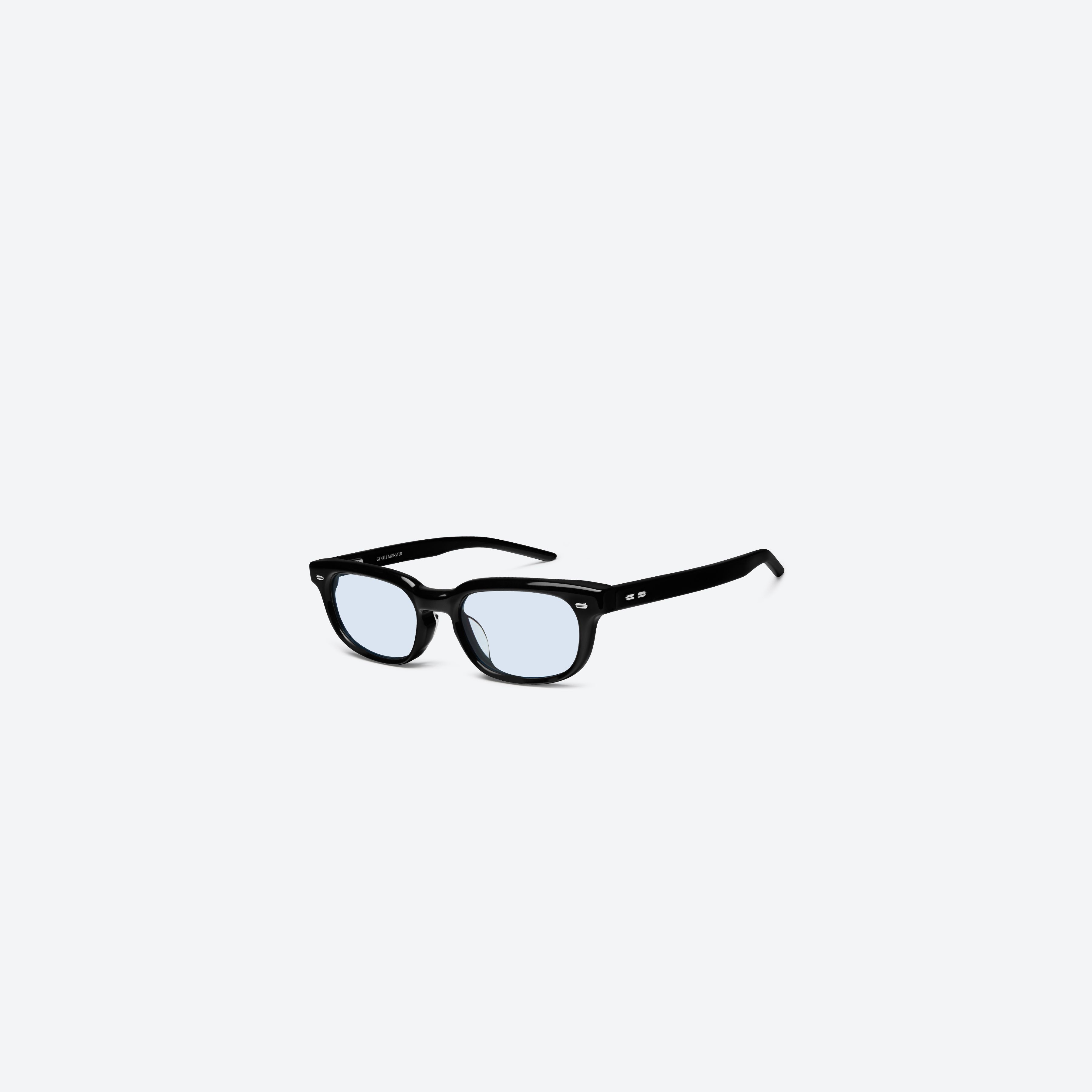 45-degree view of Gentle Monster Magg 01(bl) Black Acetate framed Round sunglasses.