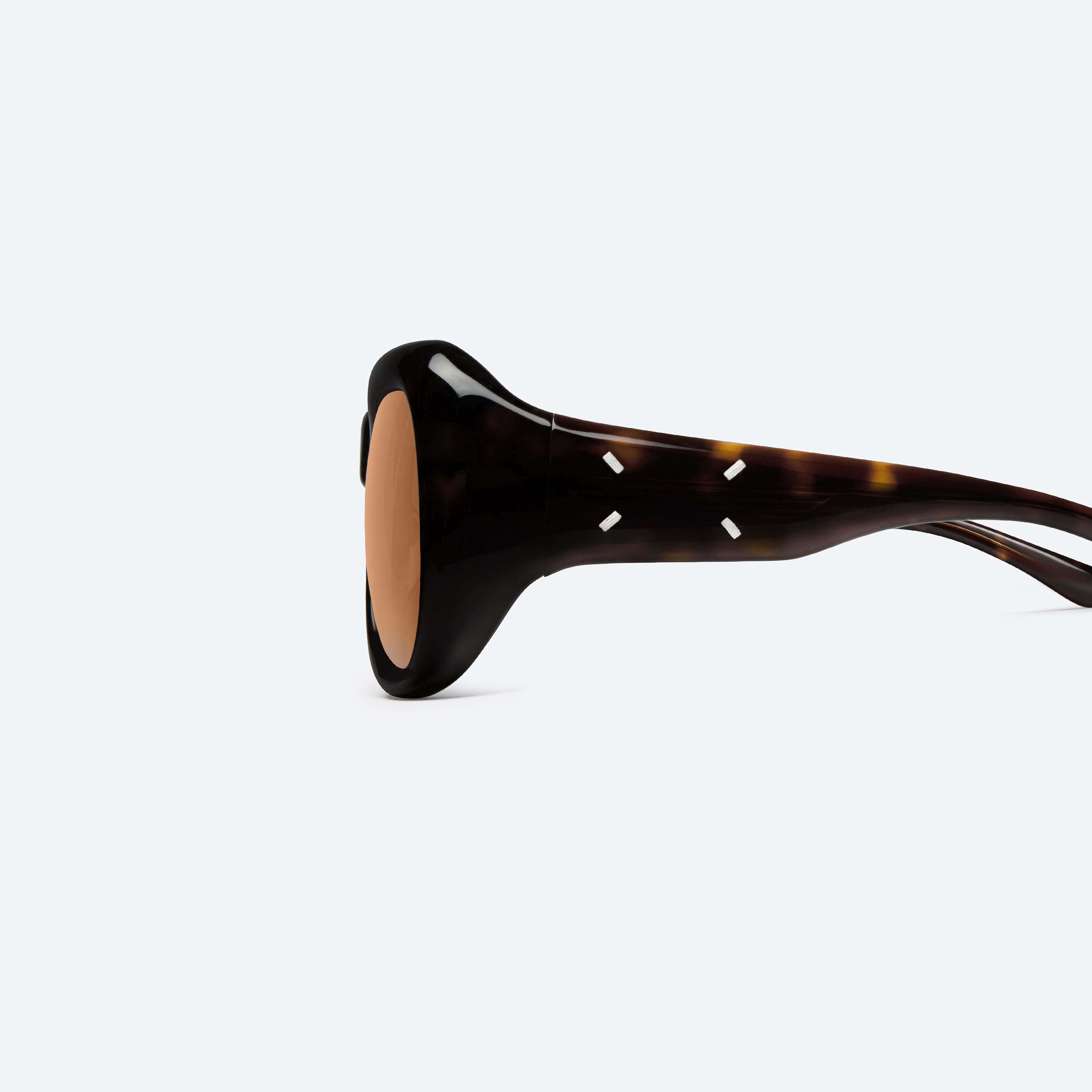 A detailed left view of Gentle Monster Maison Margiela - MM323 T1 Tortoise Acetate framed Aviator sunglasses.