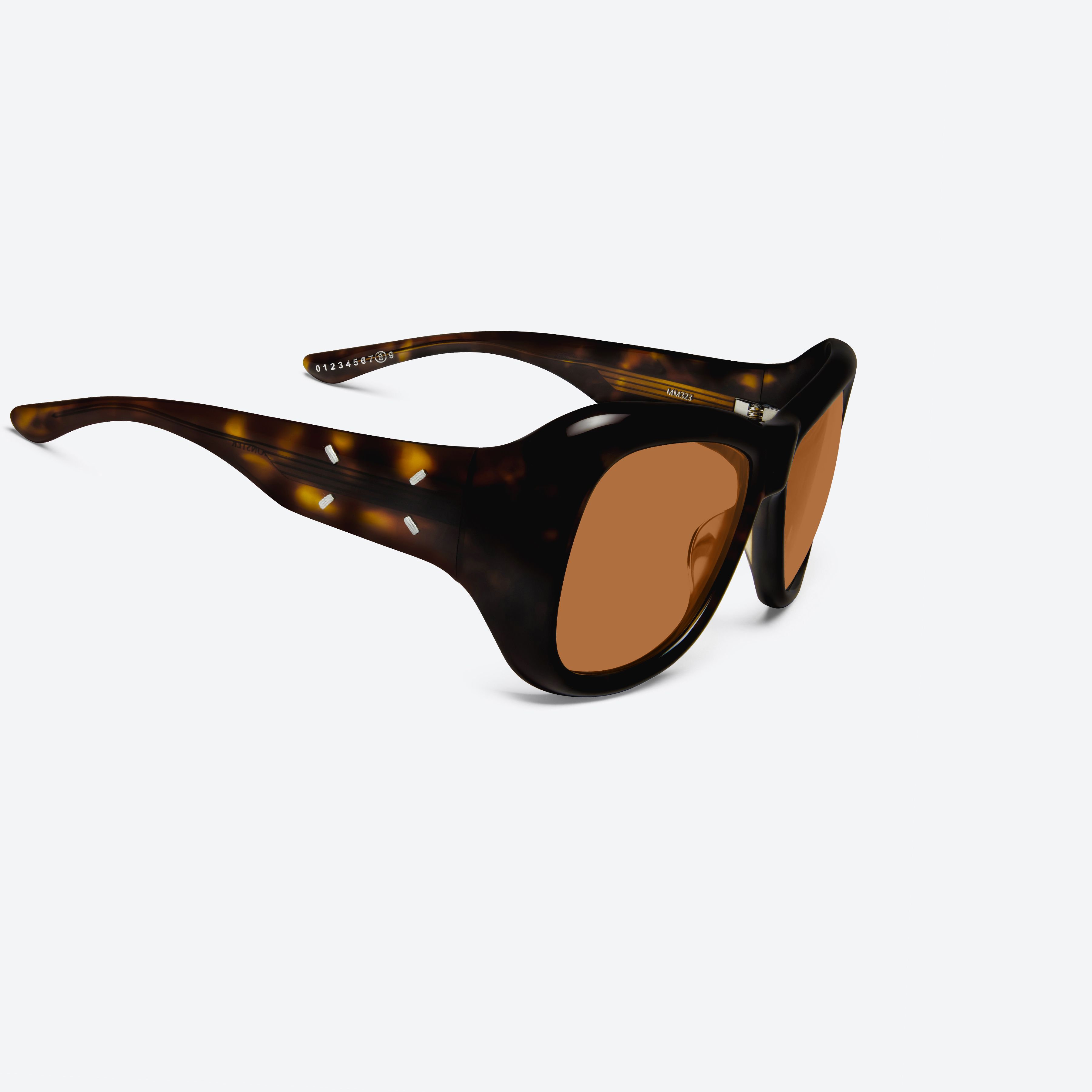 45-degree detailed view of Gentle Monster Maison Margiela - MM323 T1 Tortoise Acetate framed Aviator sunglasses.