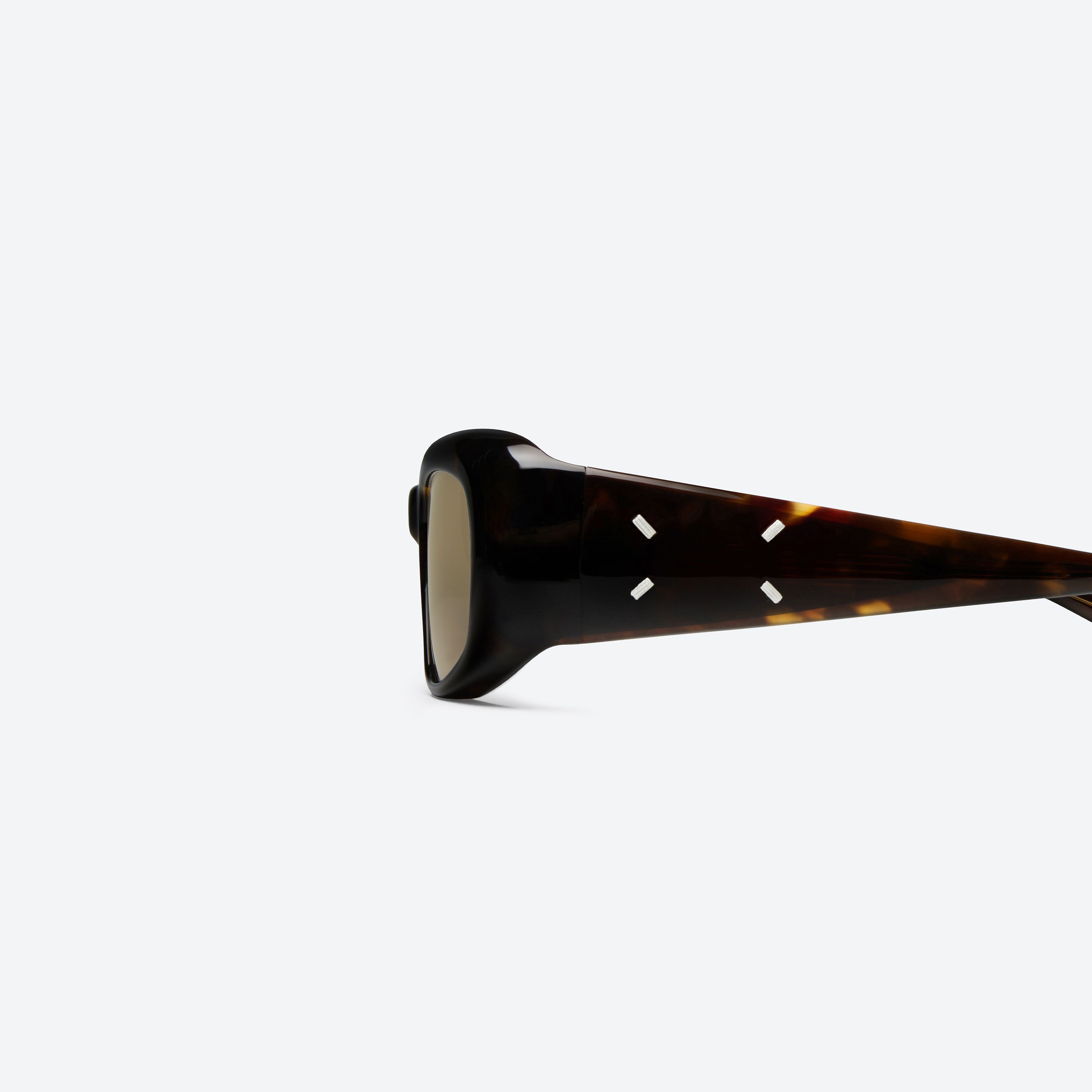A detailed left view of Gentle Monster Maison Margiela - MM324 T1 Tortoise Acetate framed Square sunglasses.