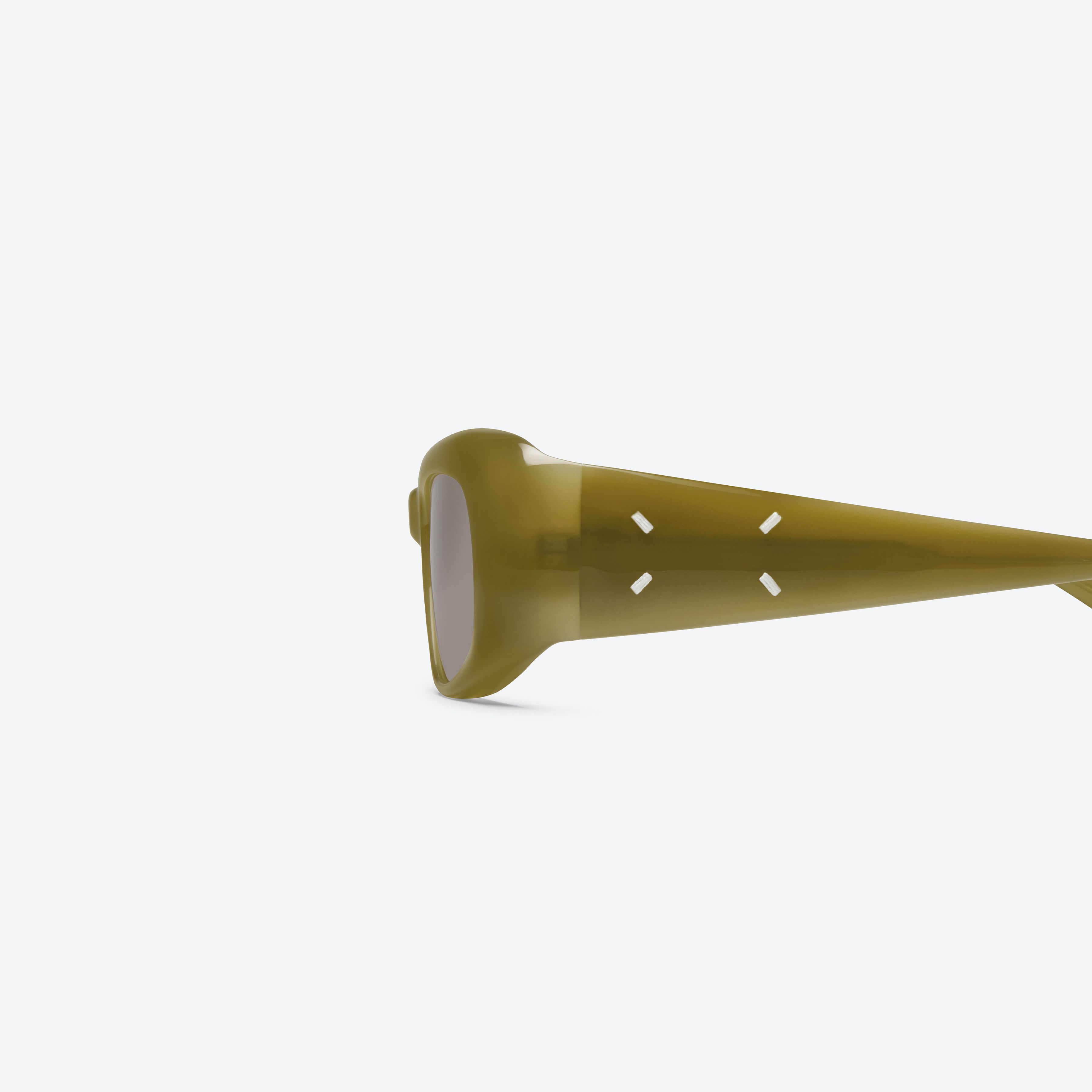 A detailed left view of Gentle Monster Maison Margiela - MM324 GRC7 Green Acetate framed Square sunglasses.