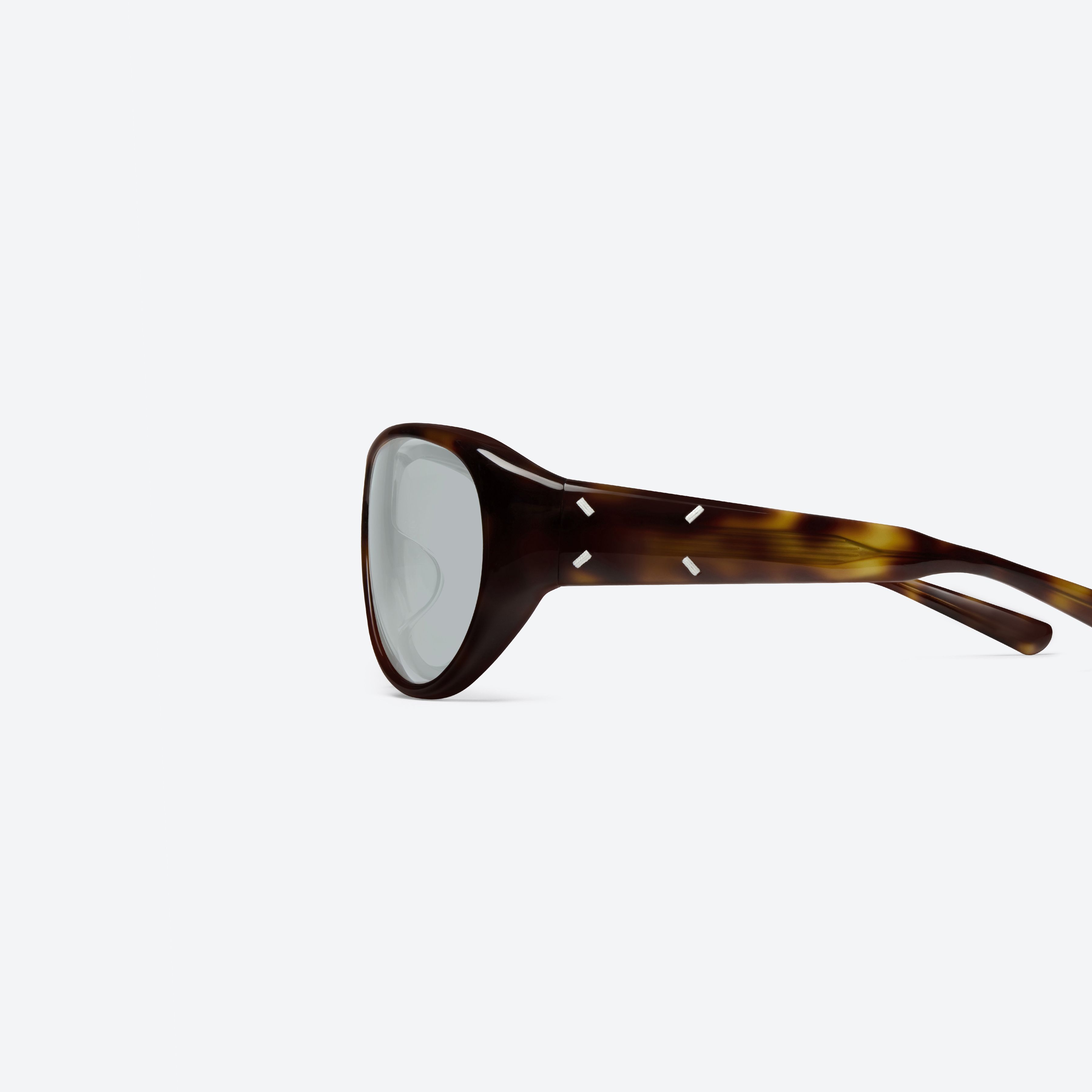 A detailed left view of Gentle Monster Maison Margiela - MM325 L2 Tortoise Acetate framed Aviator sunglasses.