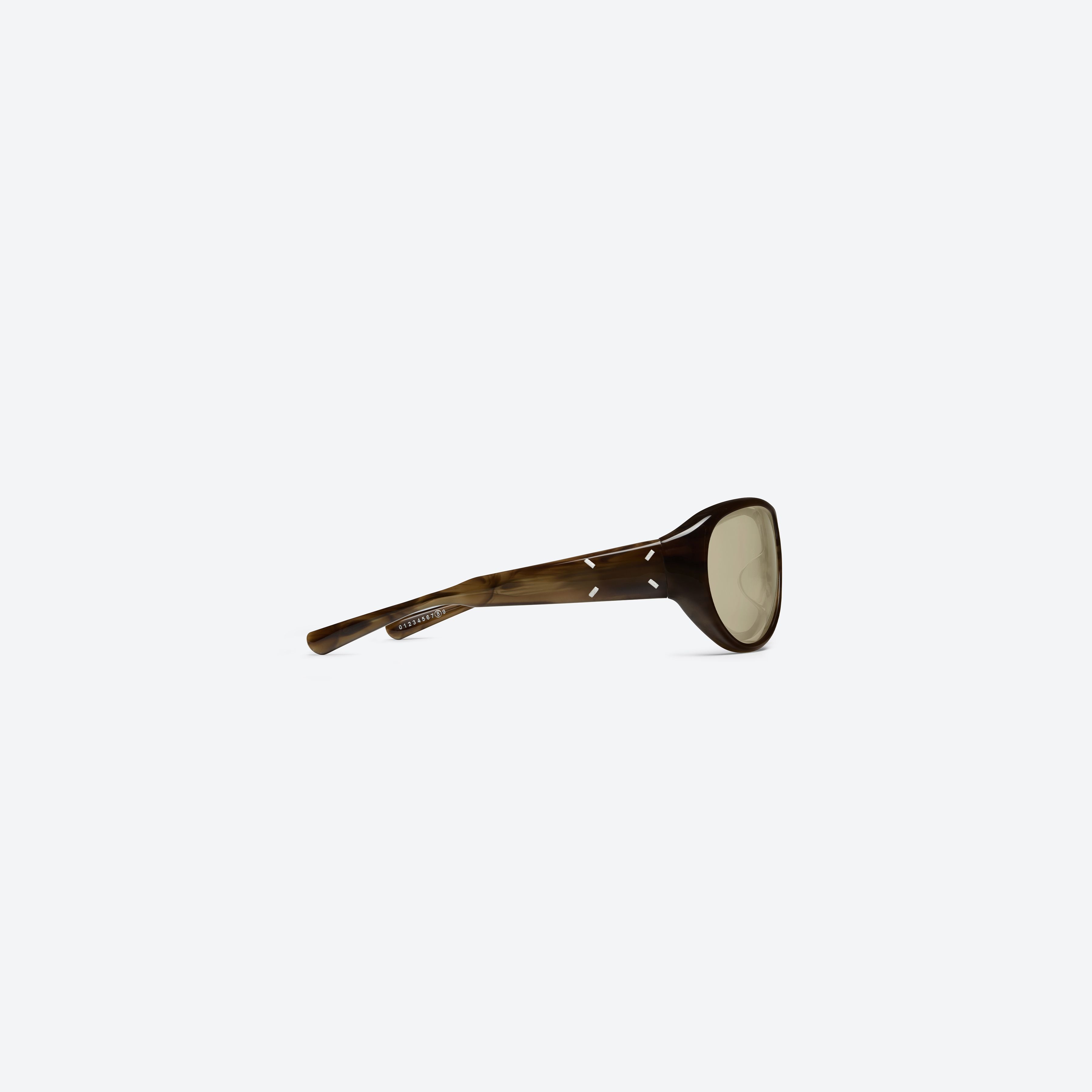 A detailed right view of Gentle Monster Maison Margiela - MM325 T14 Tortoise Acetate framed Aviator sunglasses.