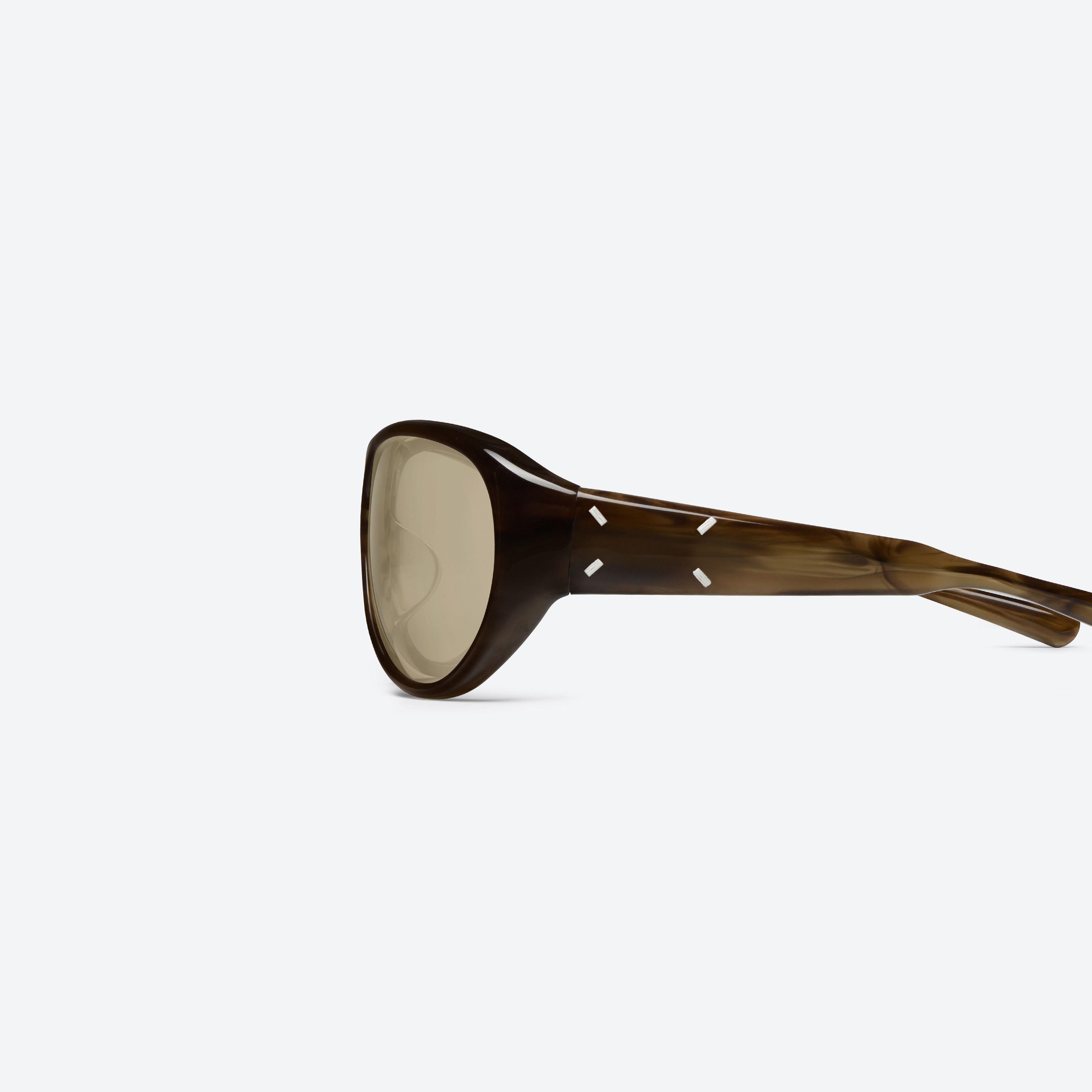 A detailed left view of Gentle Monster Maison Margiela - MM325 T14 Tortoise Acetate framed Aviator sunglasses.