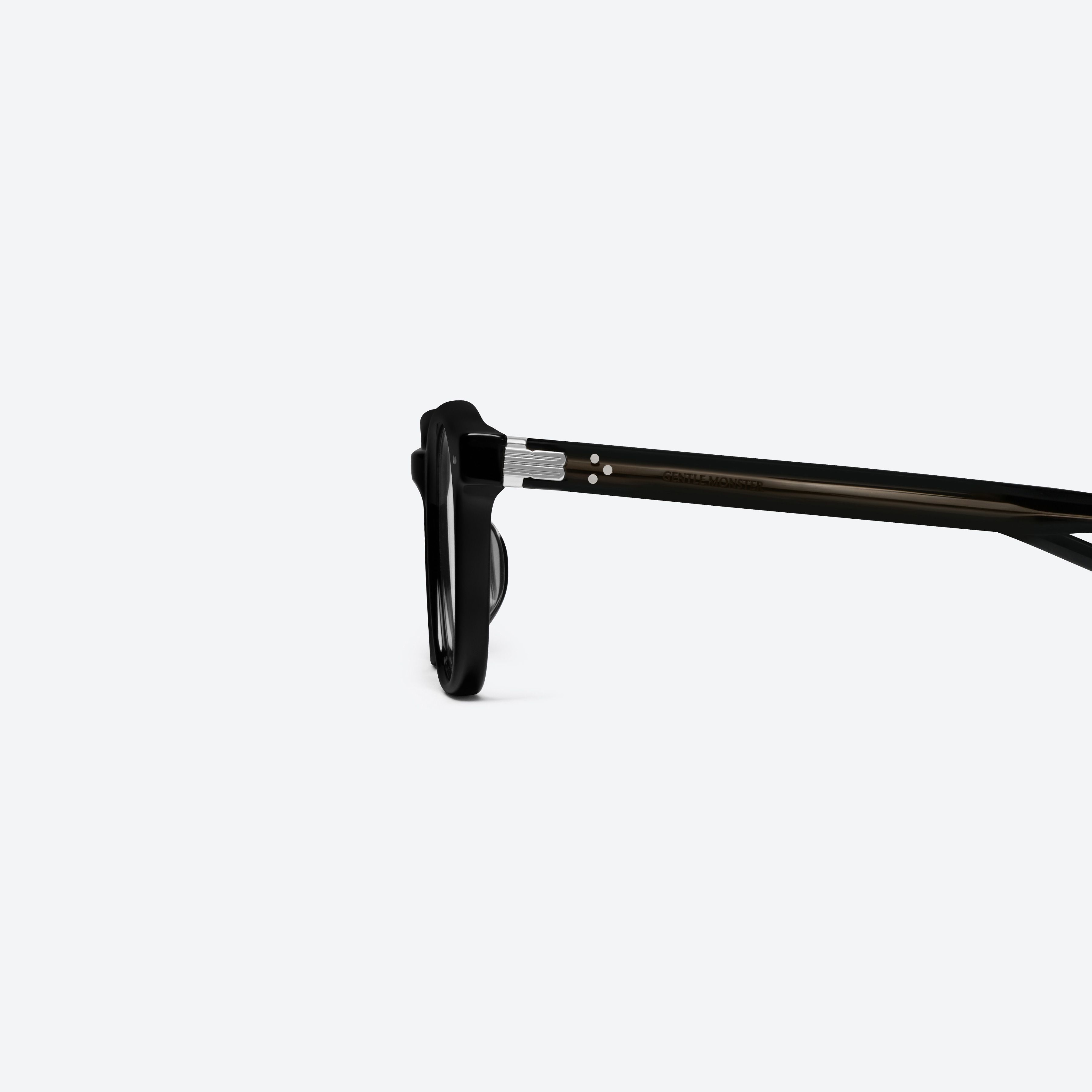 A detailed left view of Gentle Monster Poet 01 Black Acetate framed Square glasses.