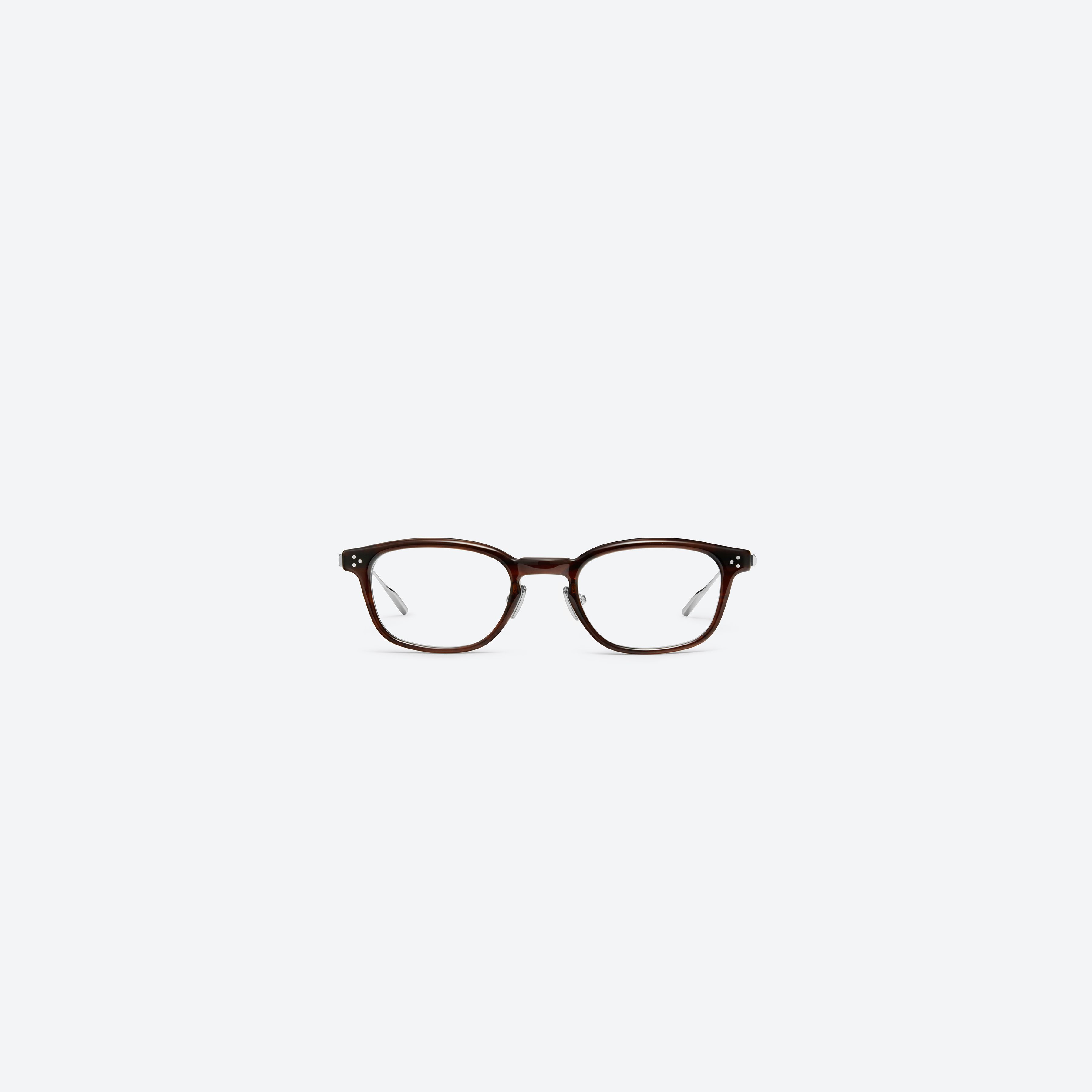 A front view of Gentle Monster Saint B4 Similar Brown Mixed framed Square glasses.